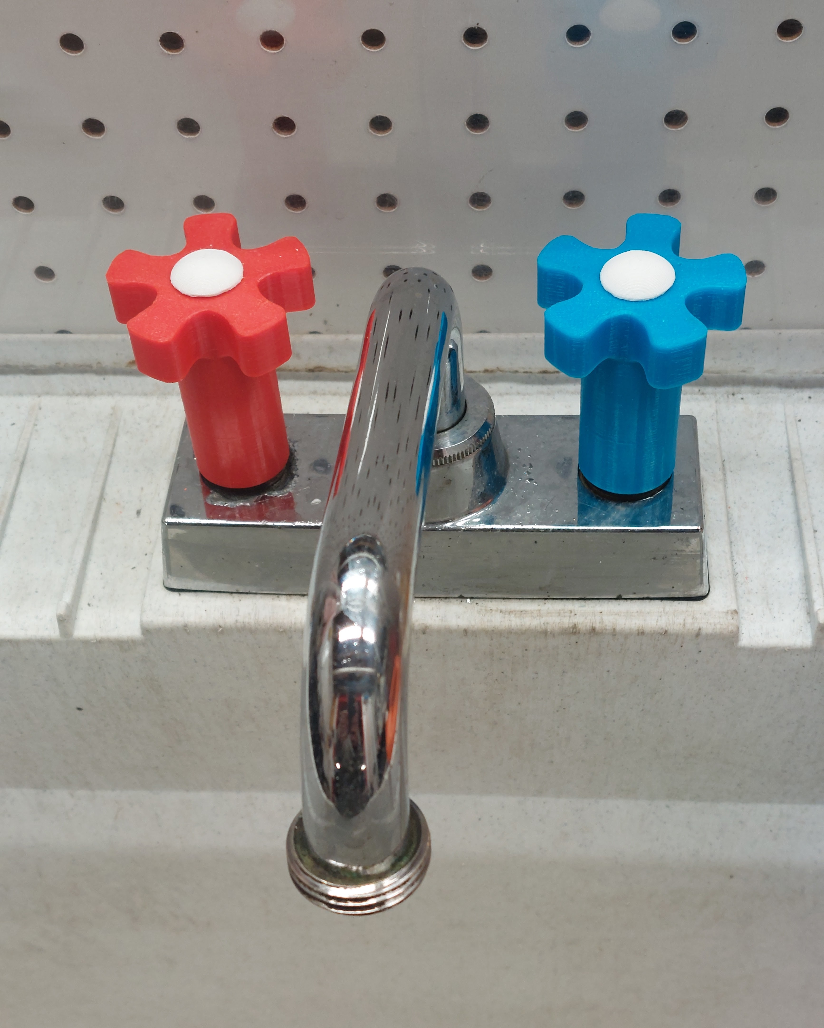 Faucet Handle. Old style flower shaped hot and cold.