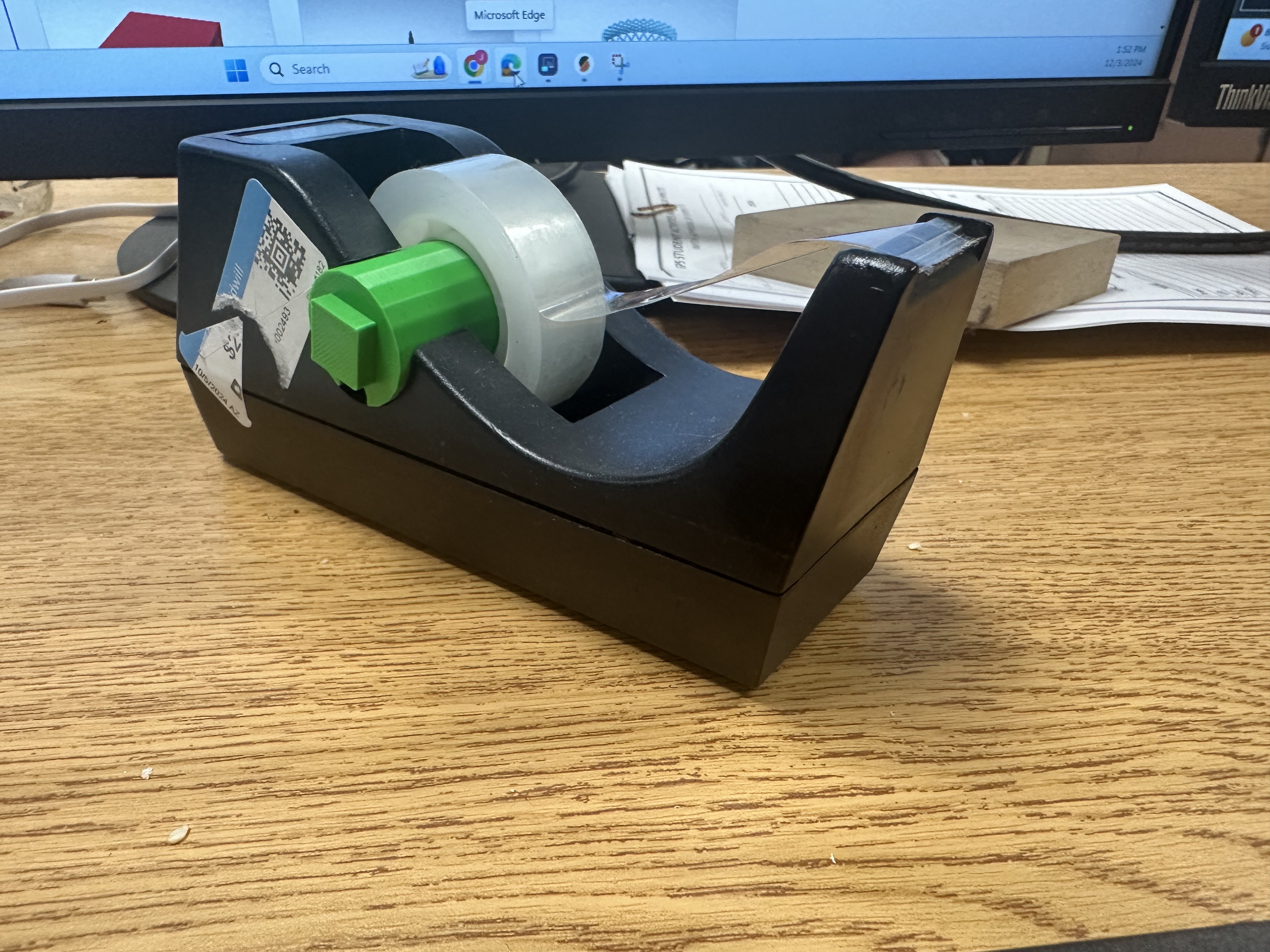 Tape Dispenser roll retainer