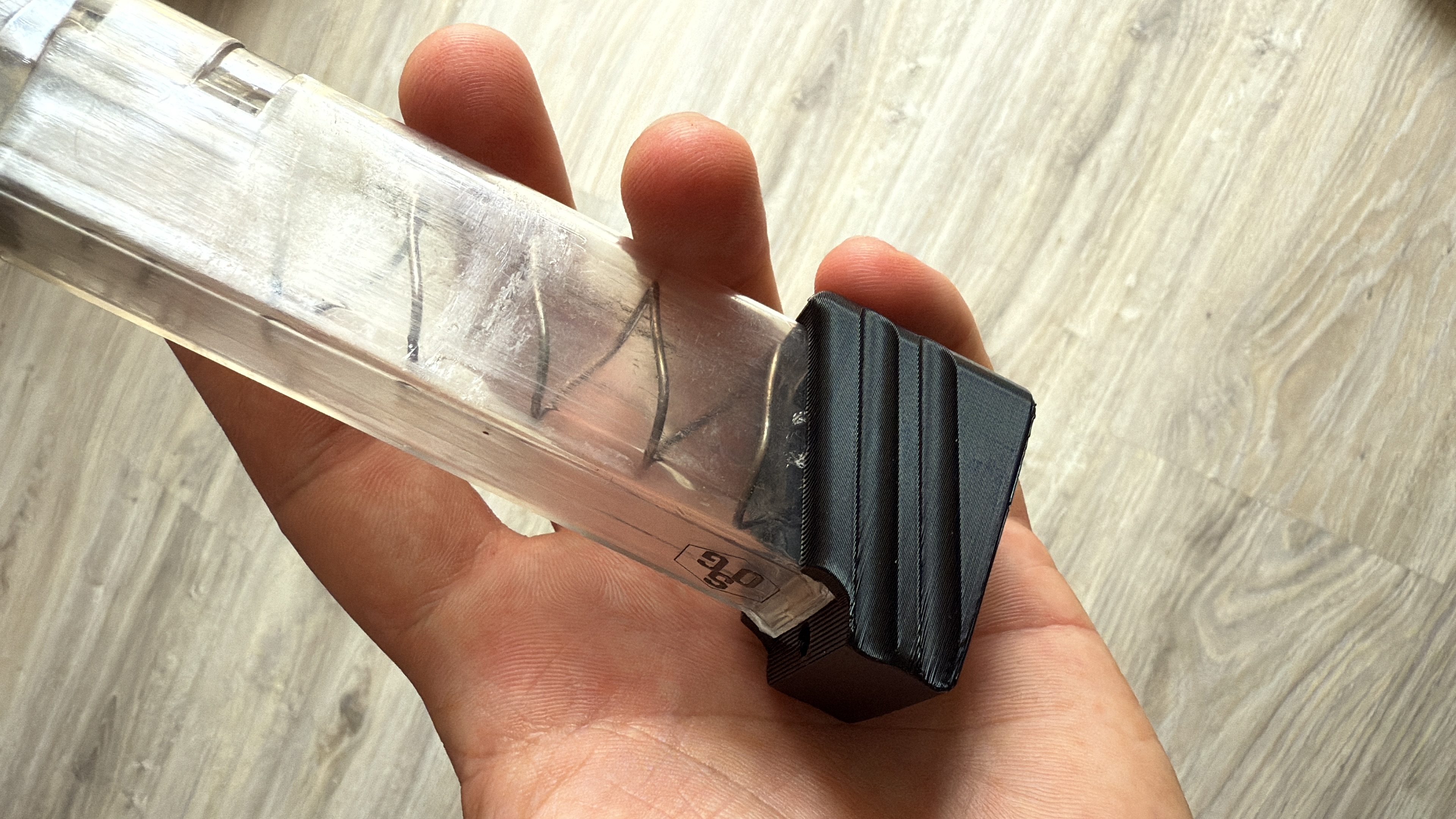 Custom magazine extension for glock magazine + 2 extra ammo.