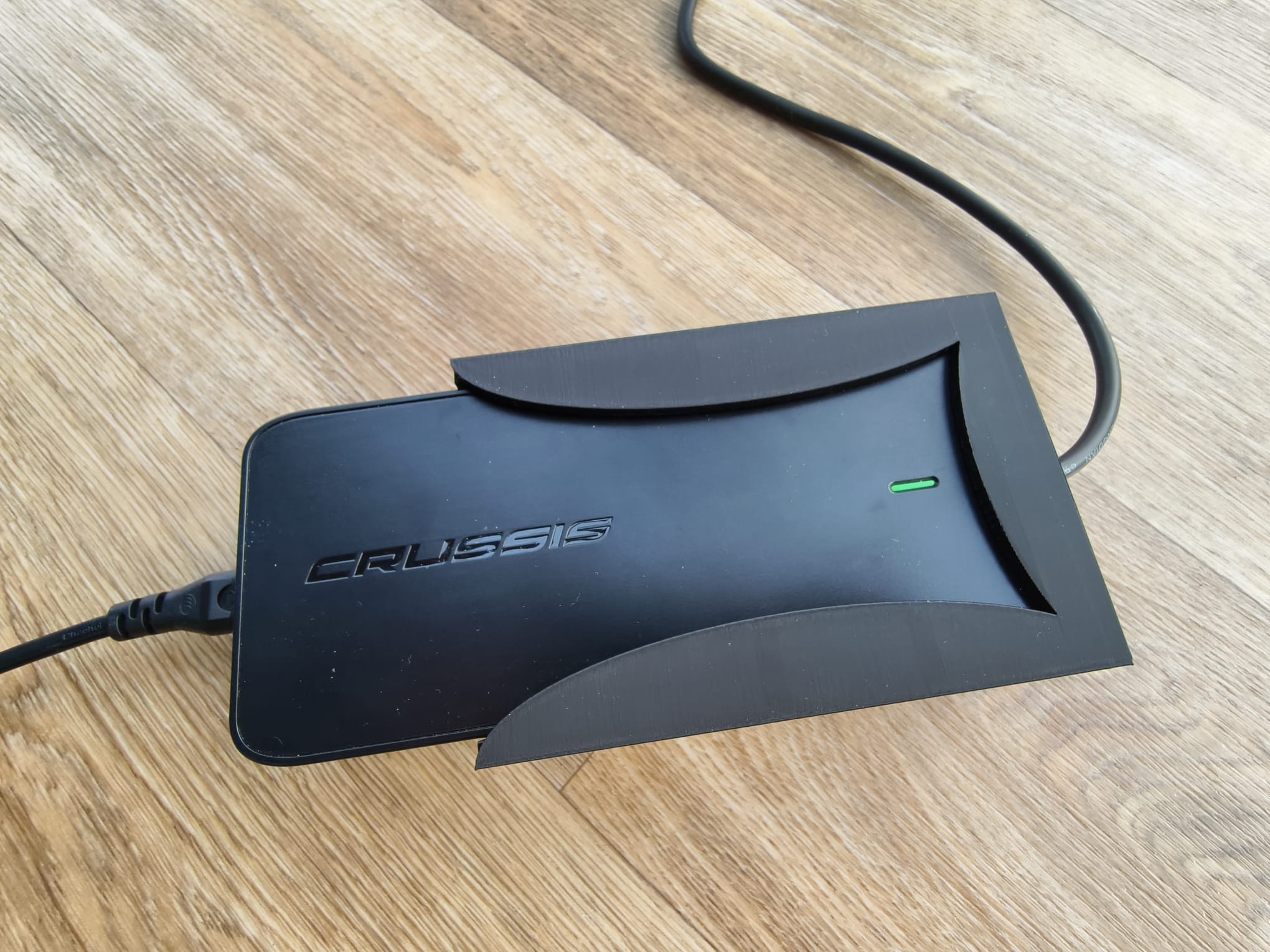 Držák nabíječky baterií elektrokola Crussis