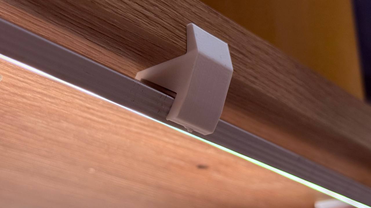 Angled LED strip holder (45° mount for shelf installation)