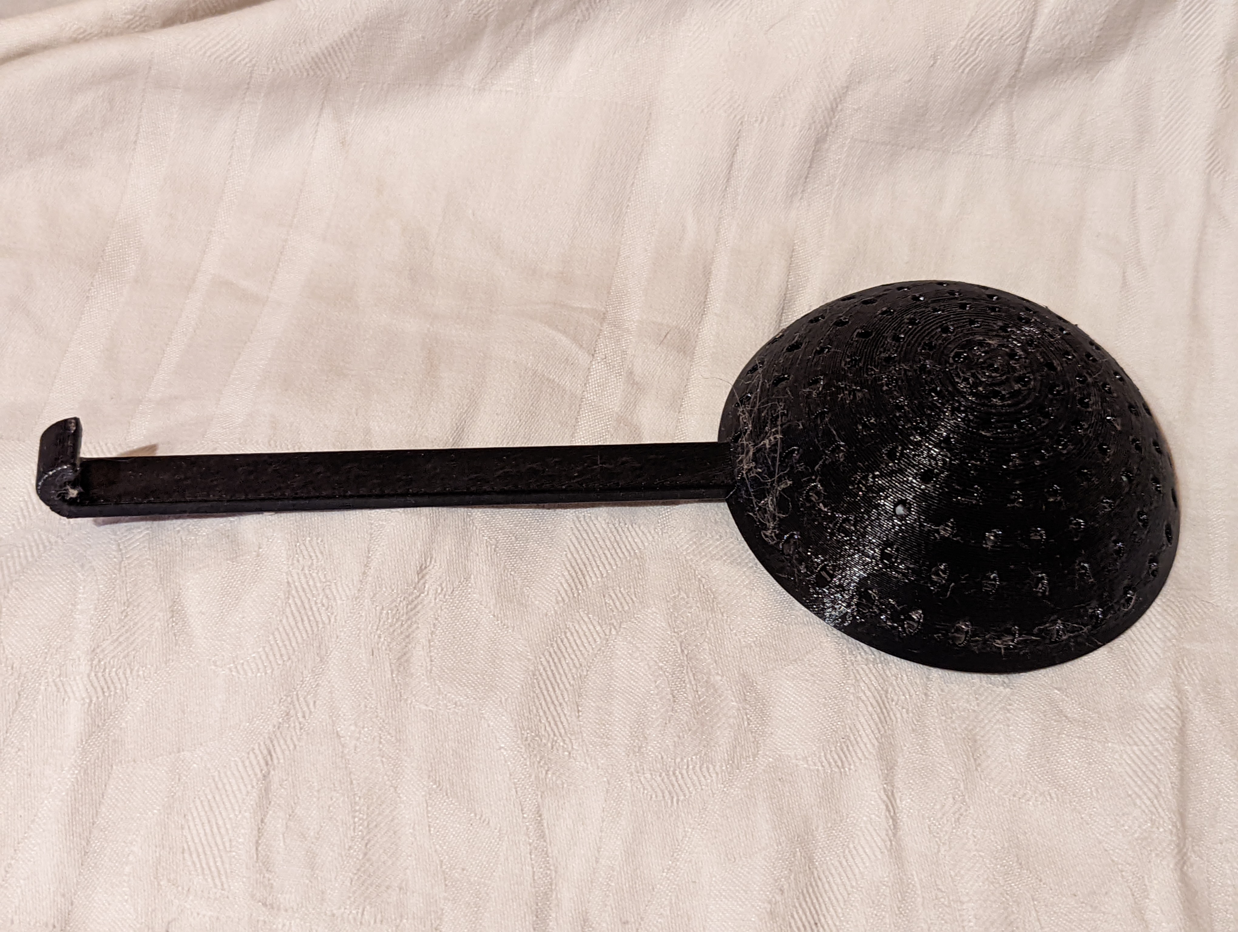 Ice fishing spoon