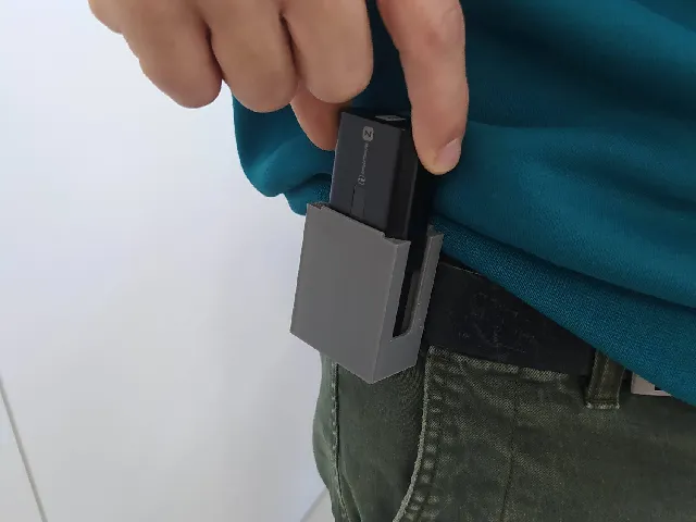Battery holder for belt