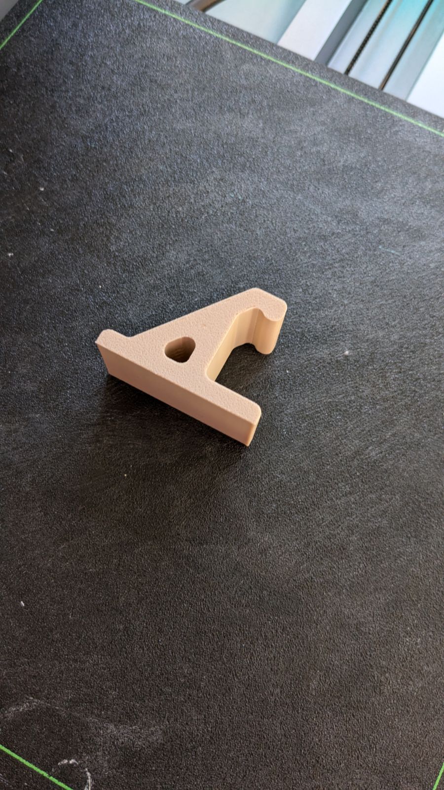 Hat hook with nail hole