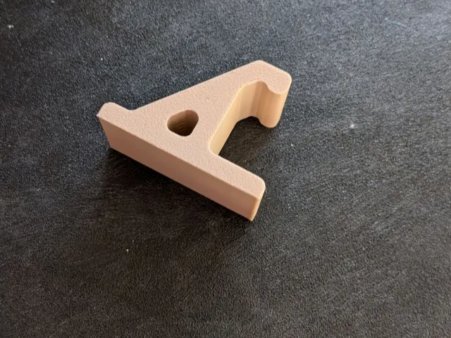 Hat hook with nail hole