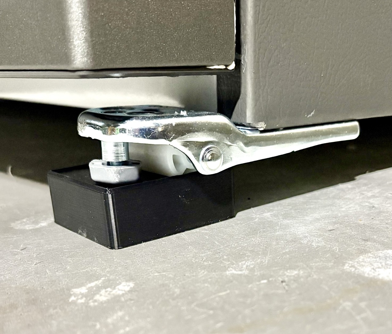 Riser for fridge or freezer with wheels on front
