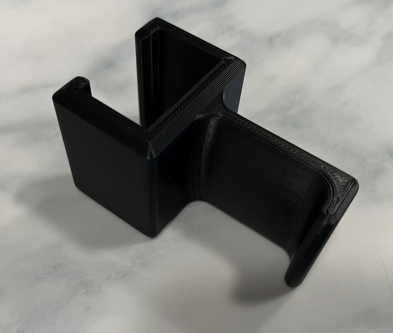 Headphones holder hook for monitor mount arm
