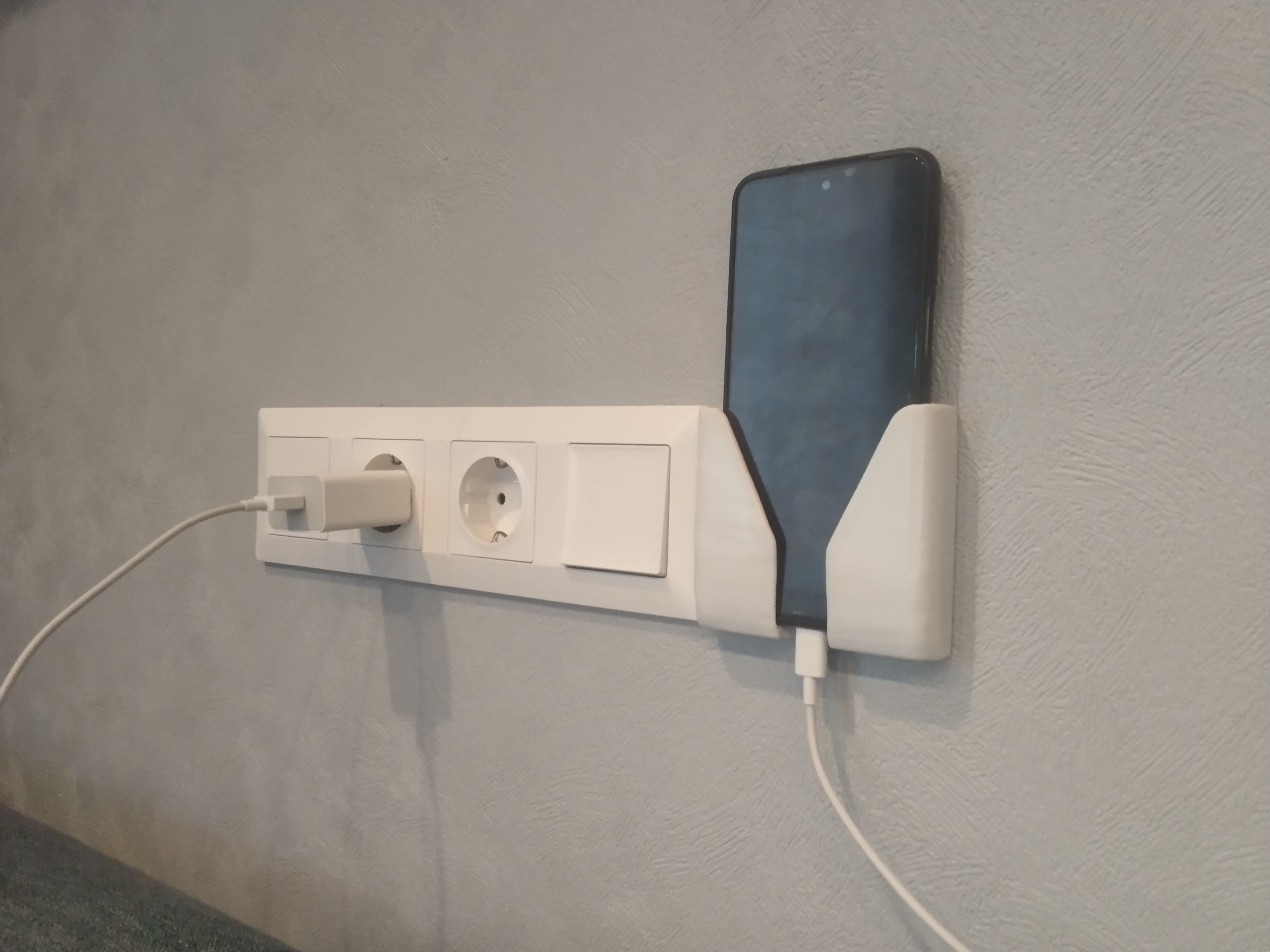 Wall phone holder