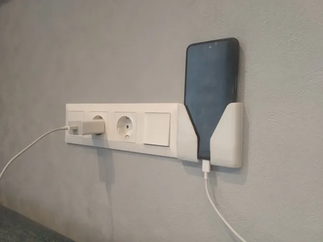 Wall phone holder