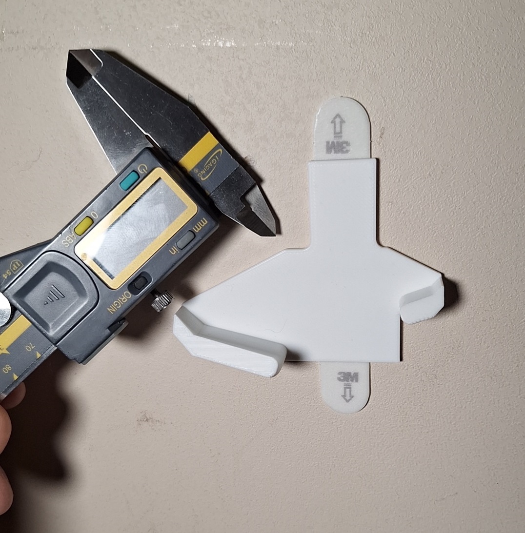 Caliper-Claw brand caliper wall mount for VHB or command strips
