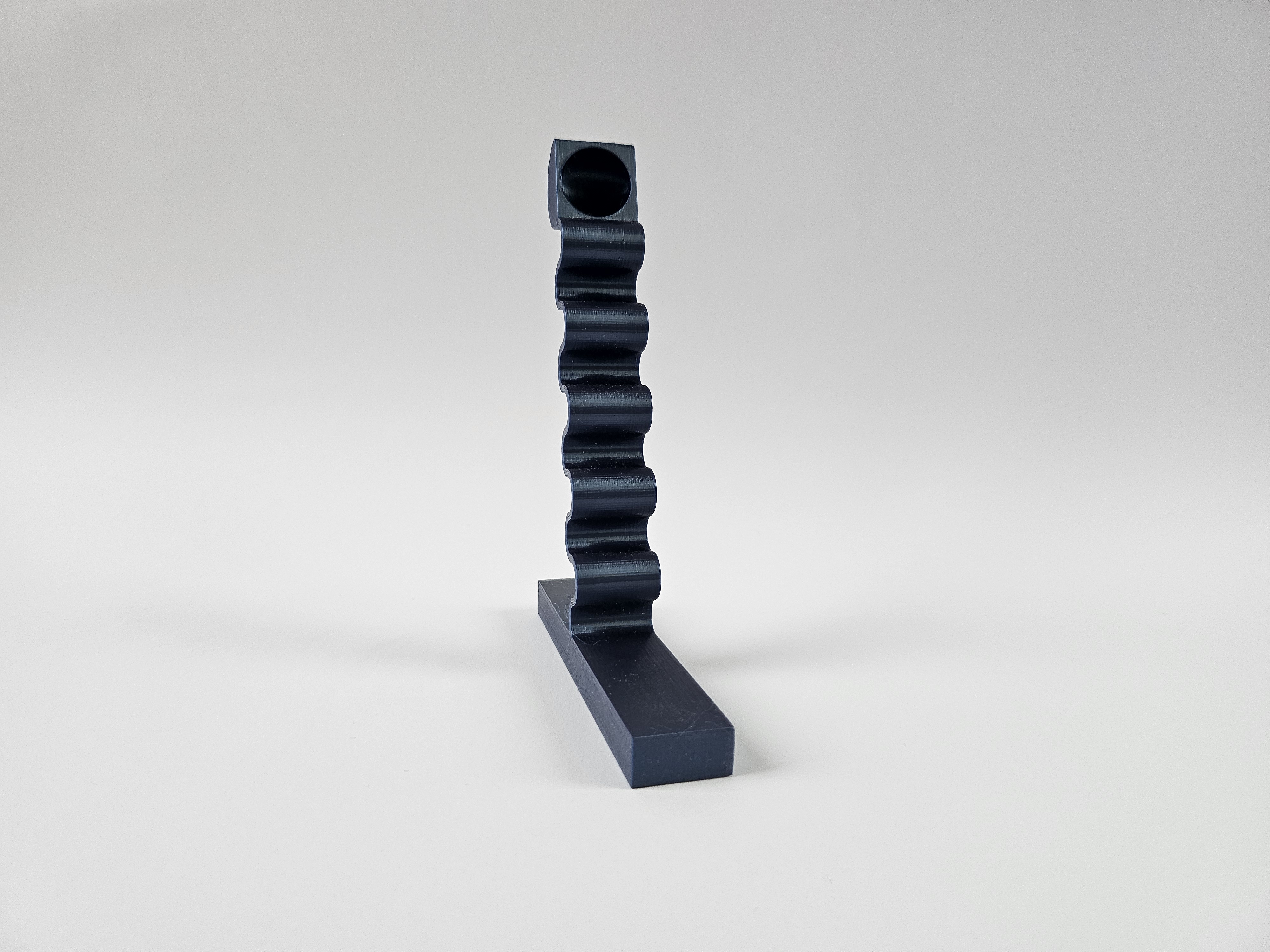 marble launcher using a non complience mechanism