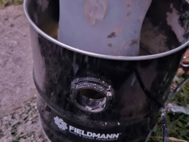 dust shield for ash vacuum