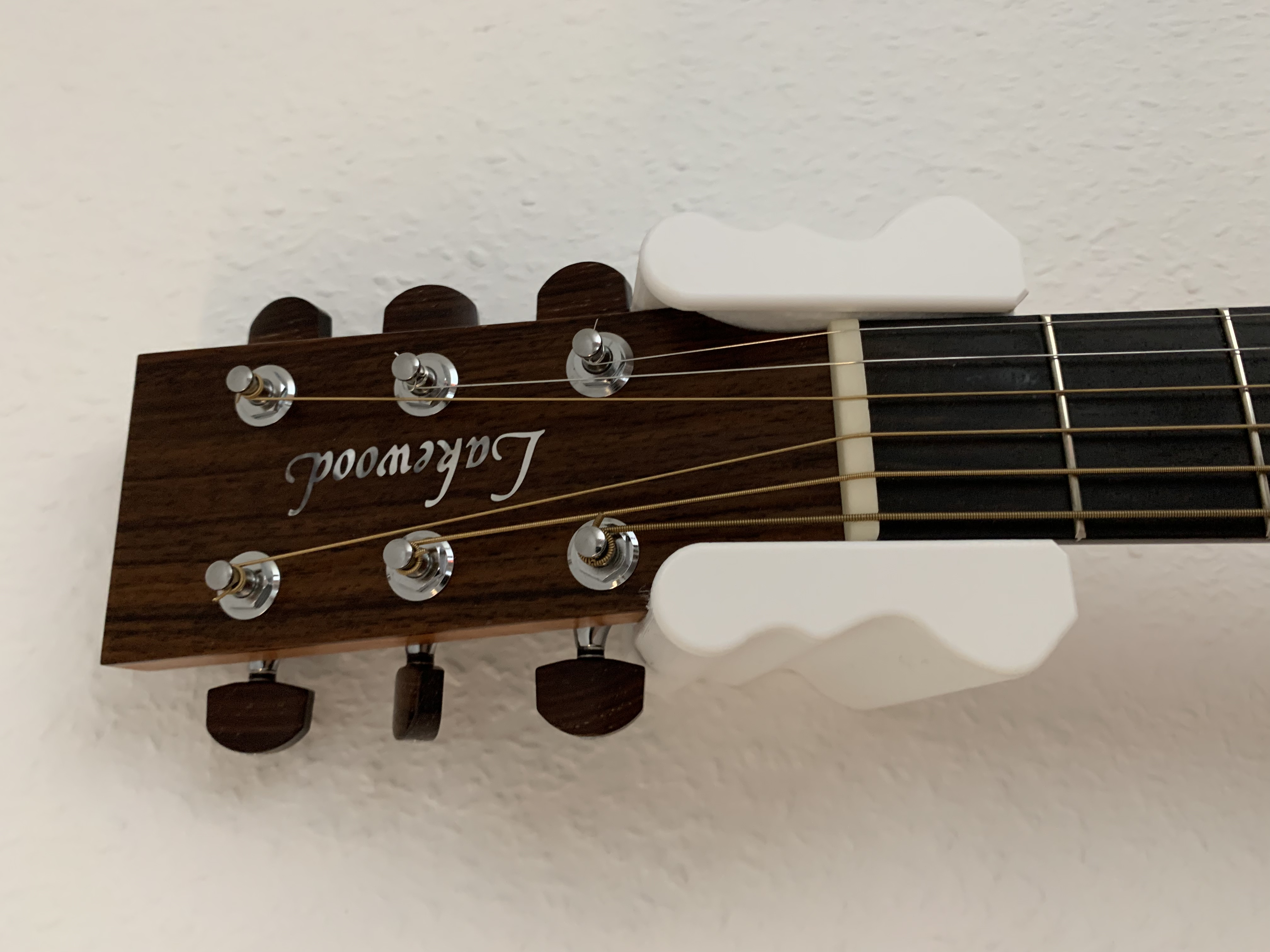 Wall hanger for western guitar