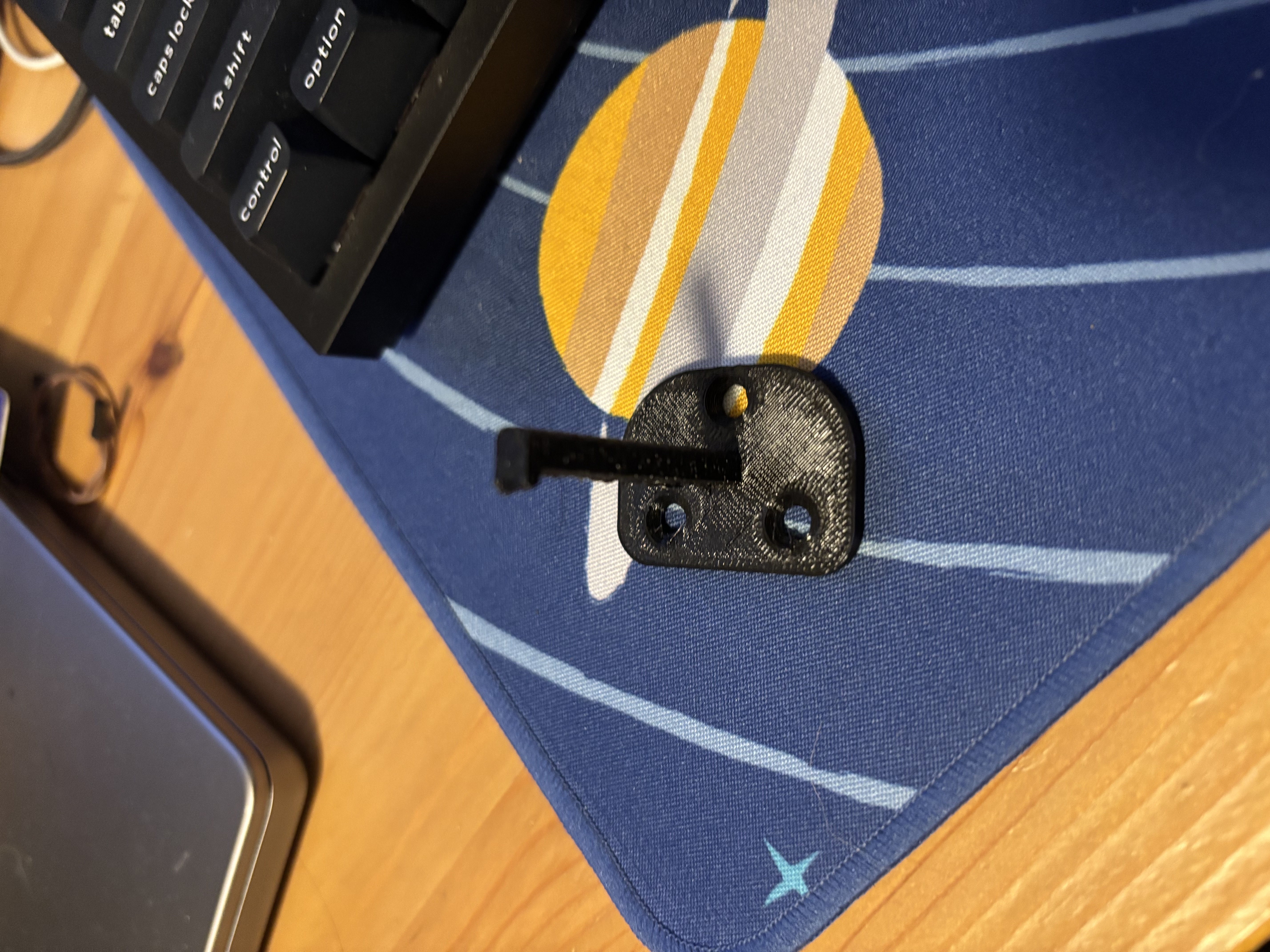 Pinocchio Racket Hanger