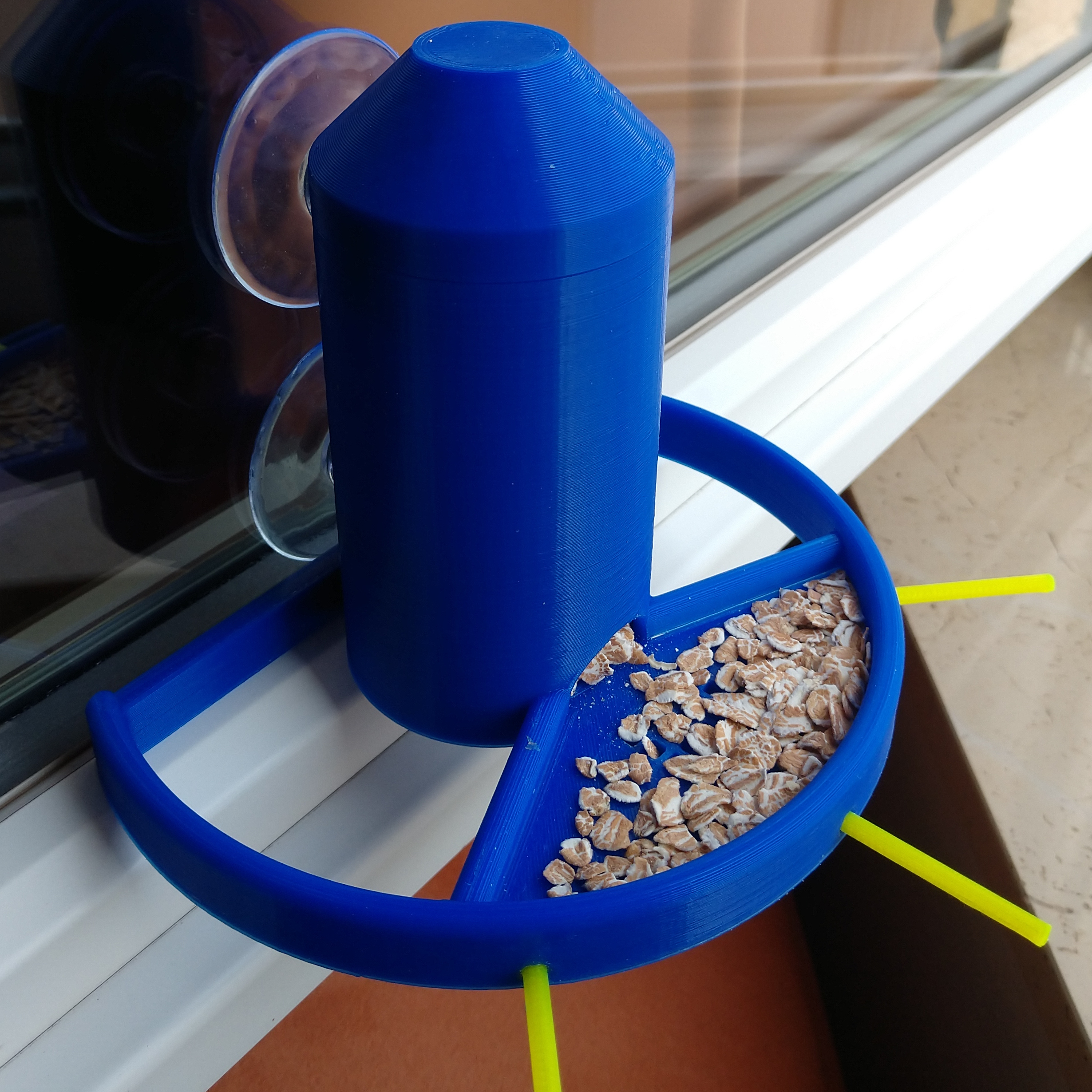 Window mounted bird feeder
