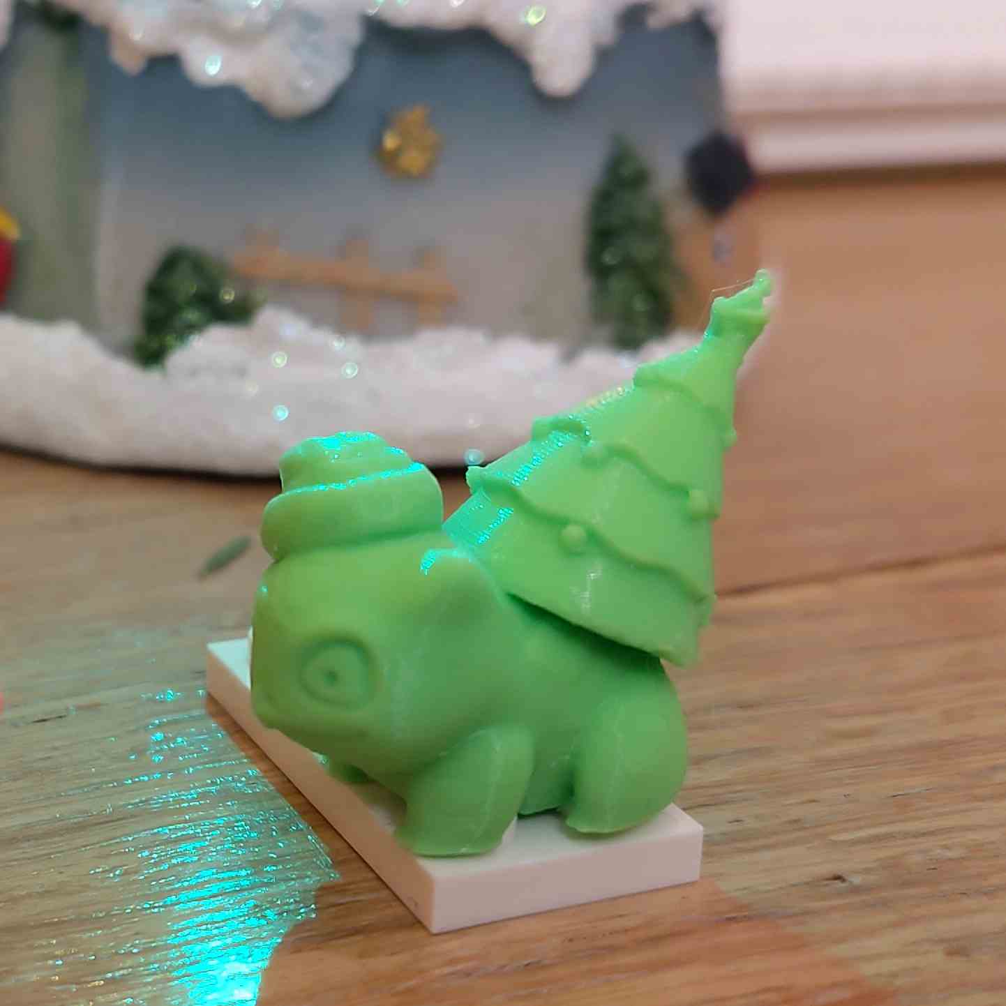 Christmas bulbasaur with tree and hat ornament on 4 lego studs