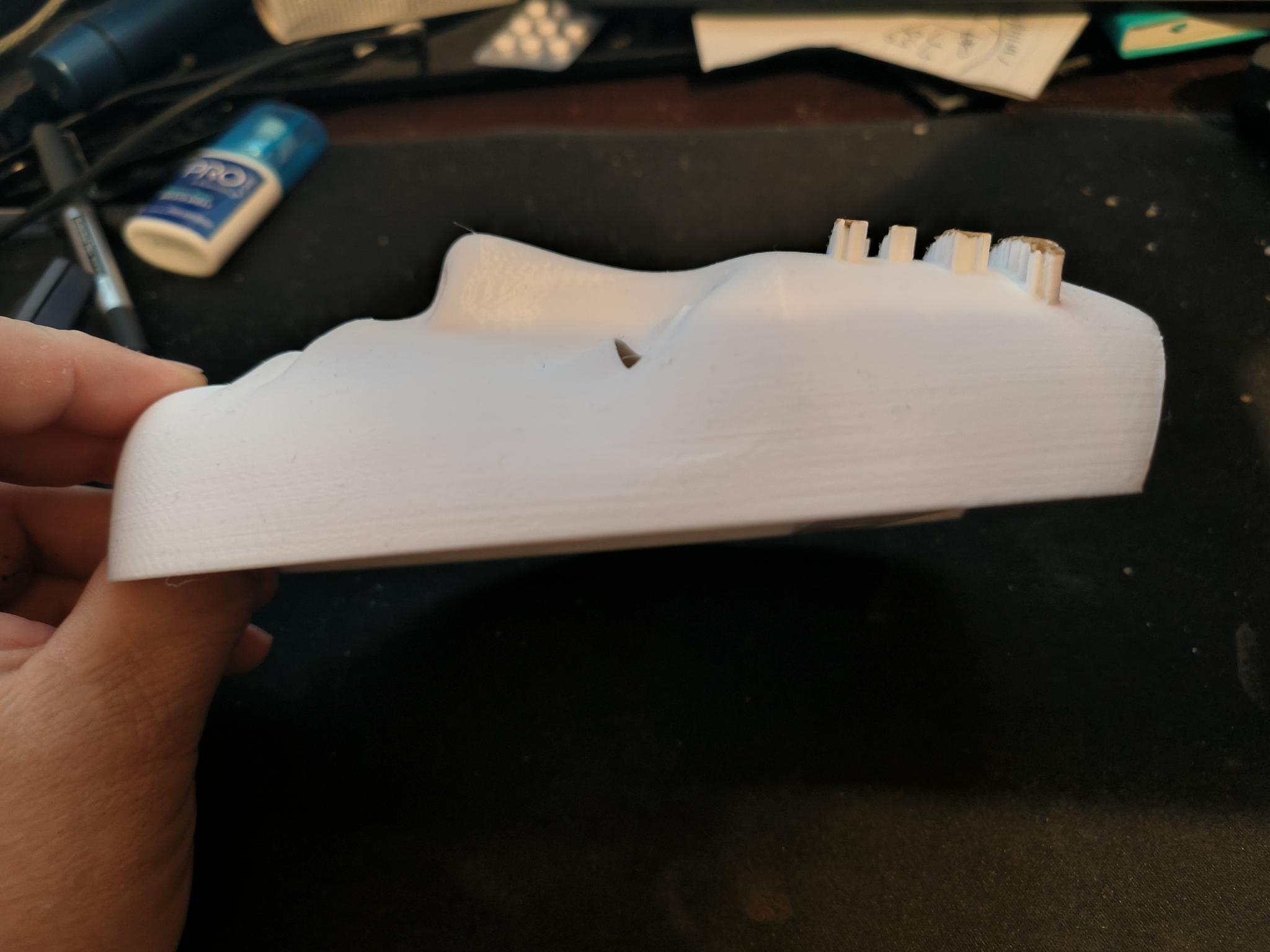 Wall mountable mask with text.