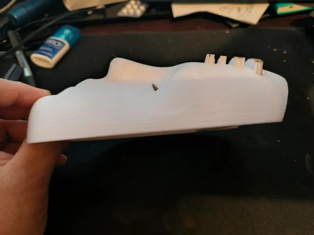 Wall mountable mask with text.