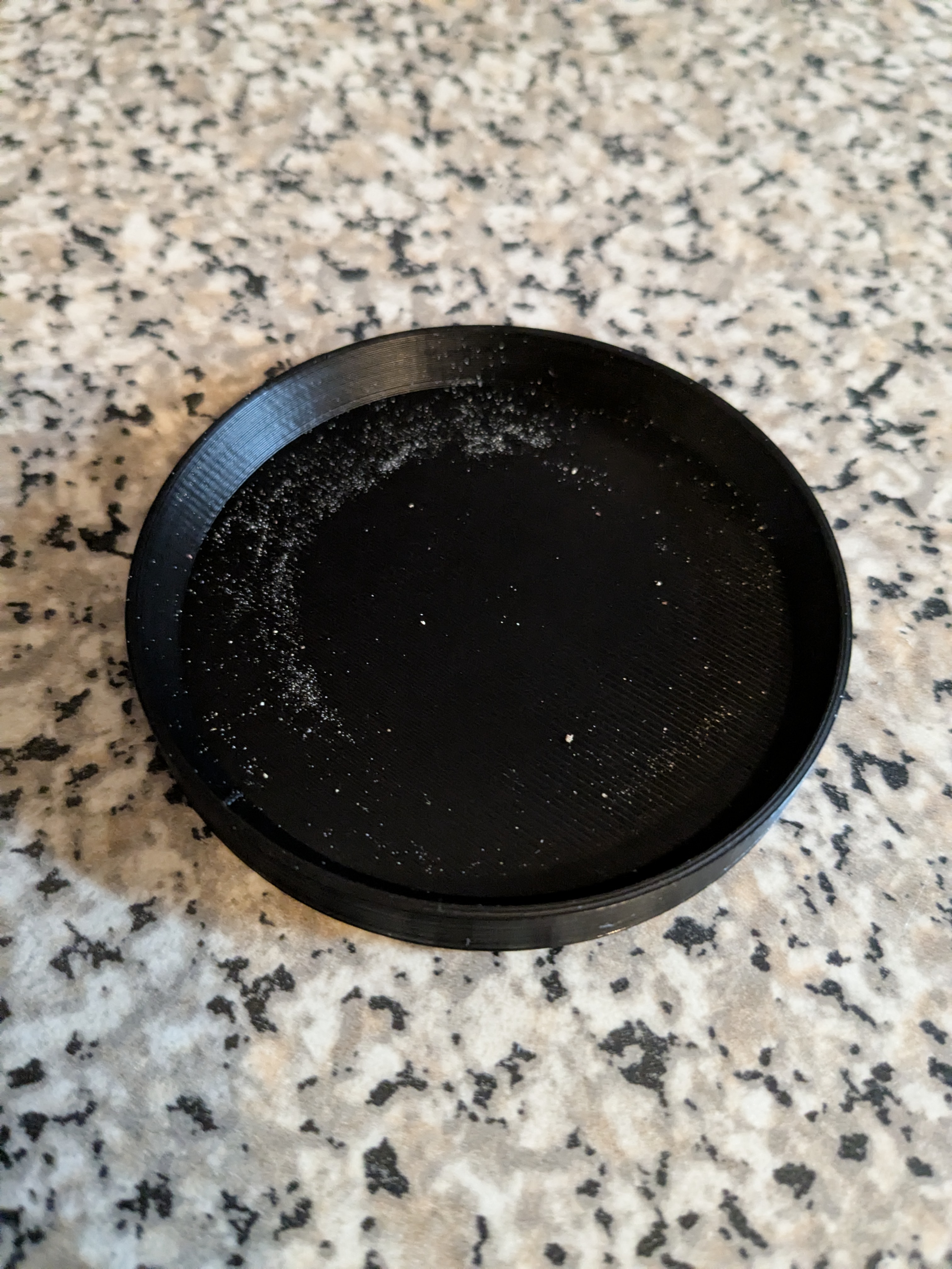 Coaster for a pepper grinder