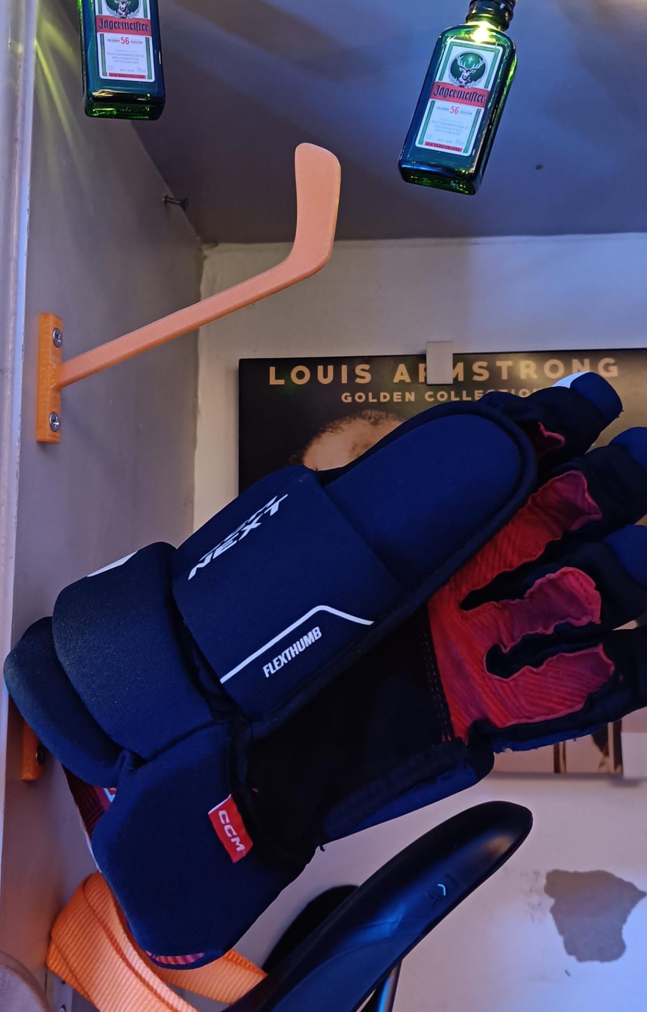 Hockey glove hanger