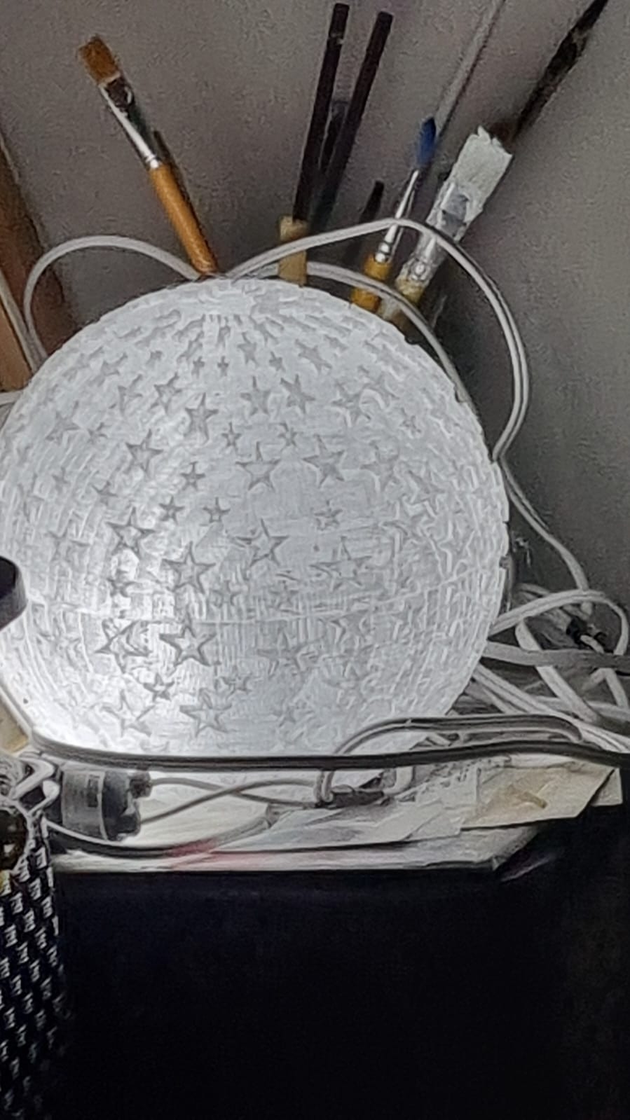 globe or sphere studded with stars of different sizes - celestial globe lamp solstitial columns freemasonry