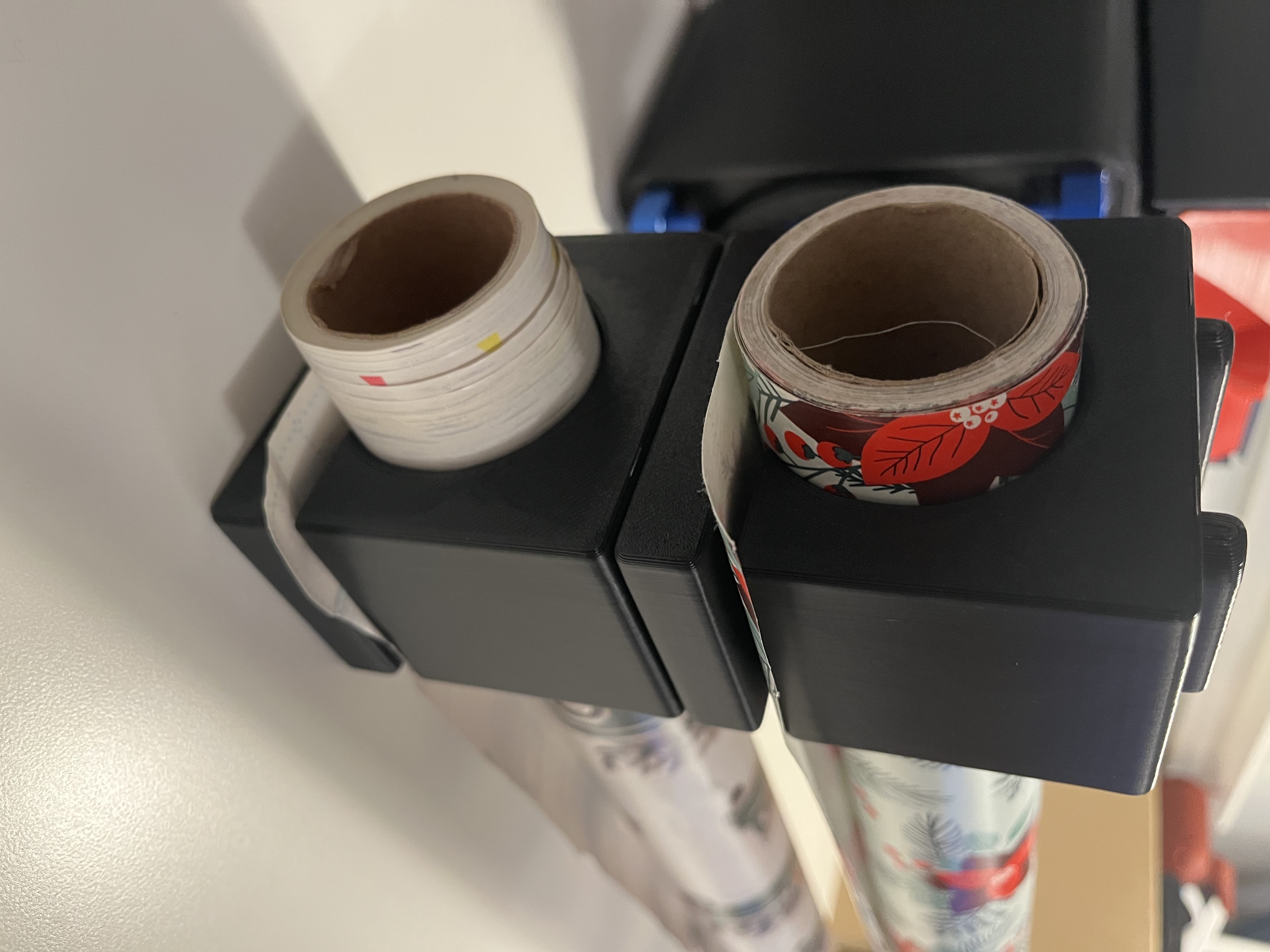 Stackable wrapping paper holder/dispenser with wall mount
