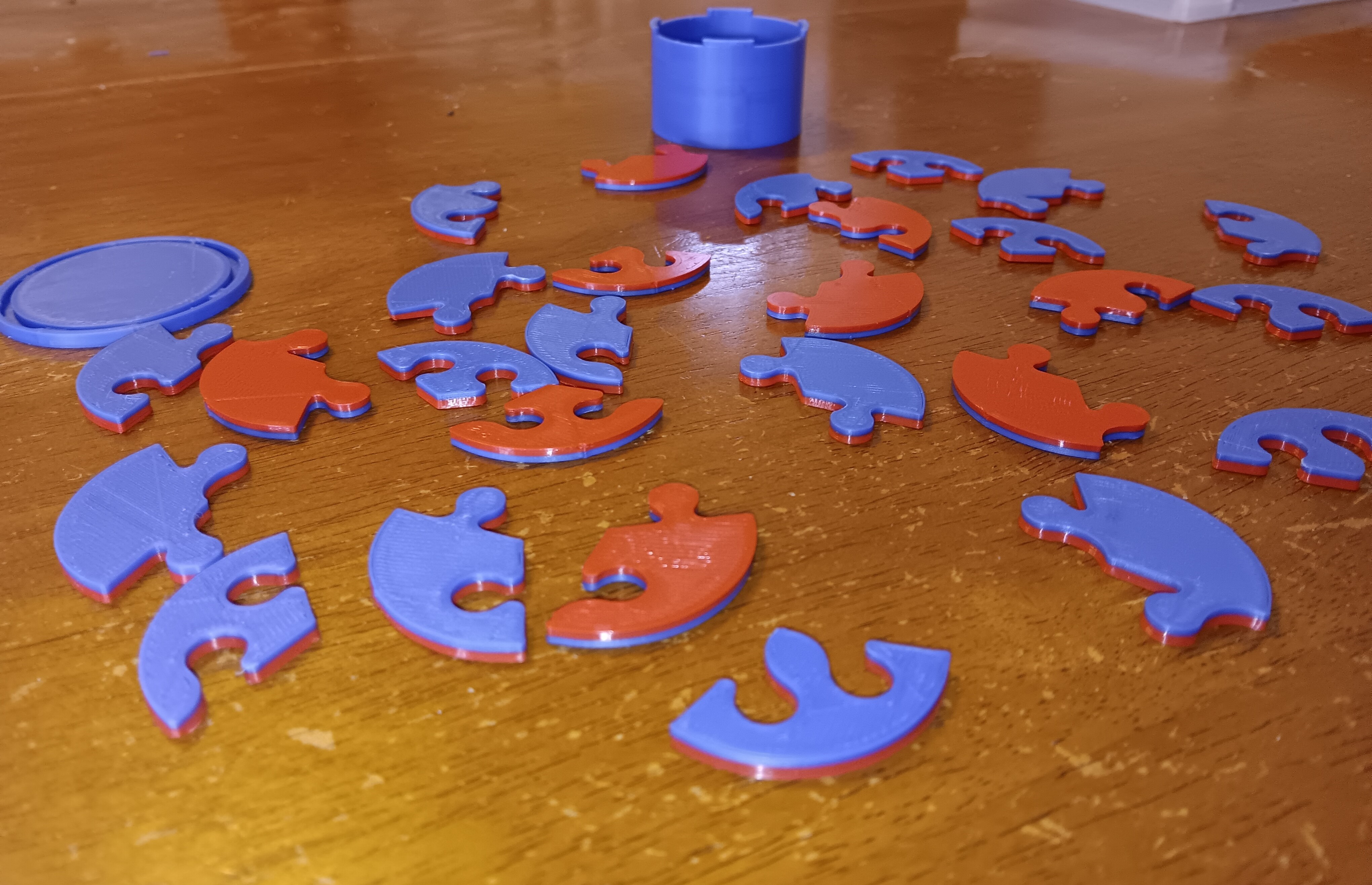 Two-sided disk puzzle and optional jar
