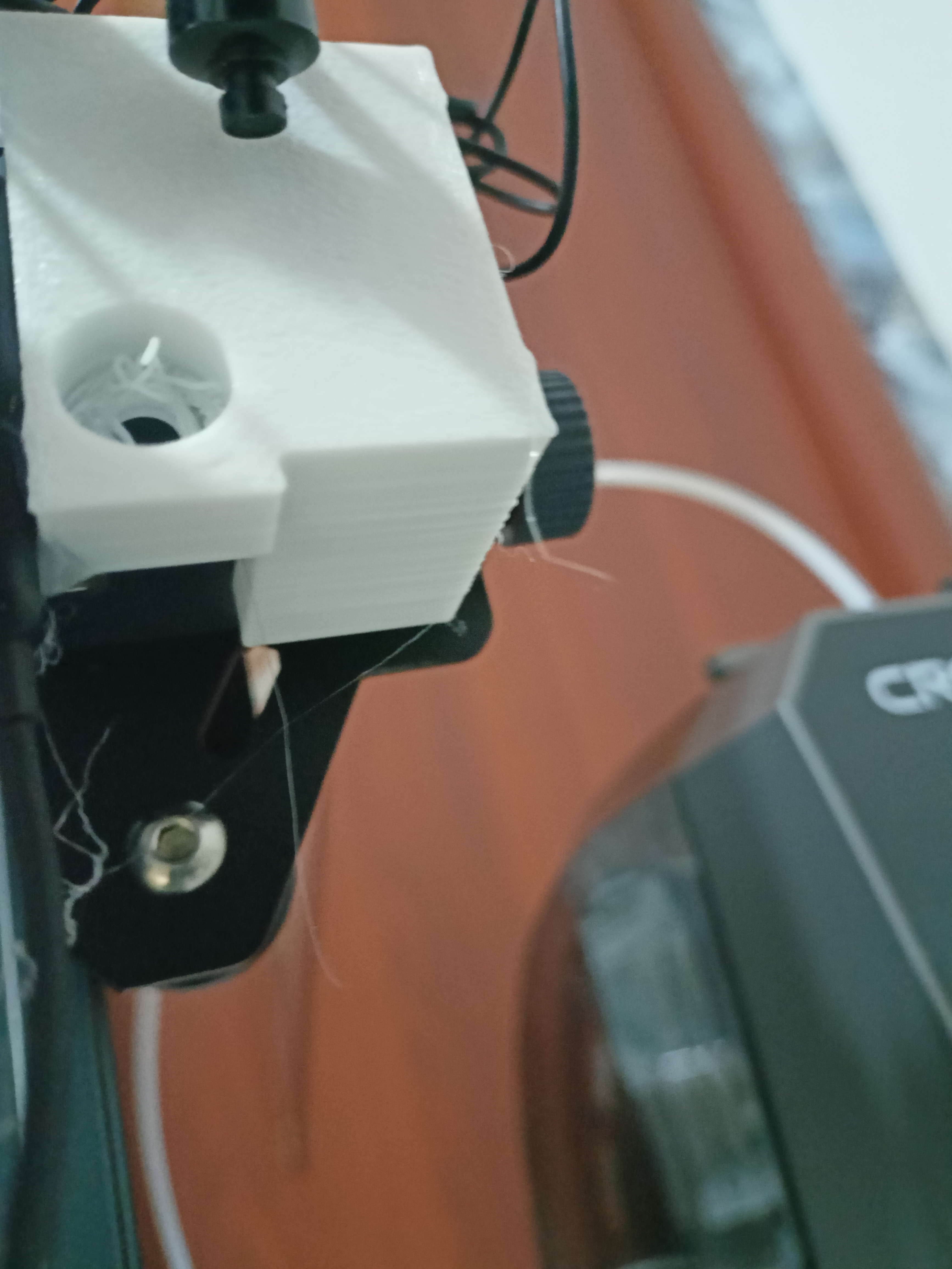 Headphones trigger for shooting time-lapse photography mount for elegoo neptune 4 pro.  printed with white PETG plastic