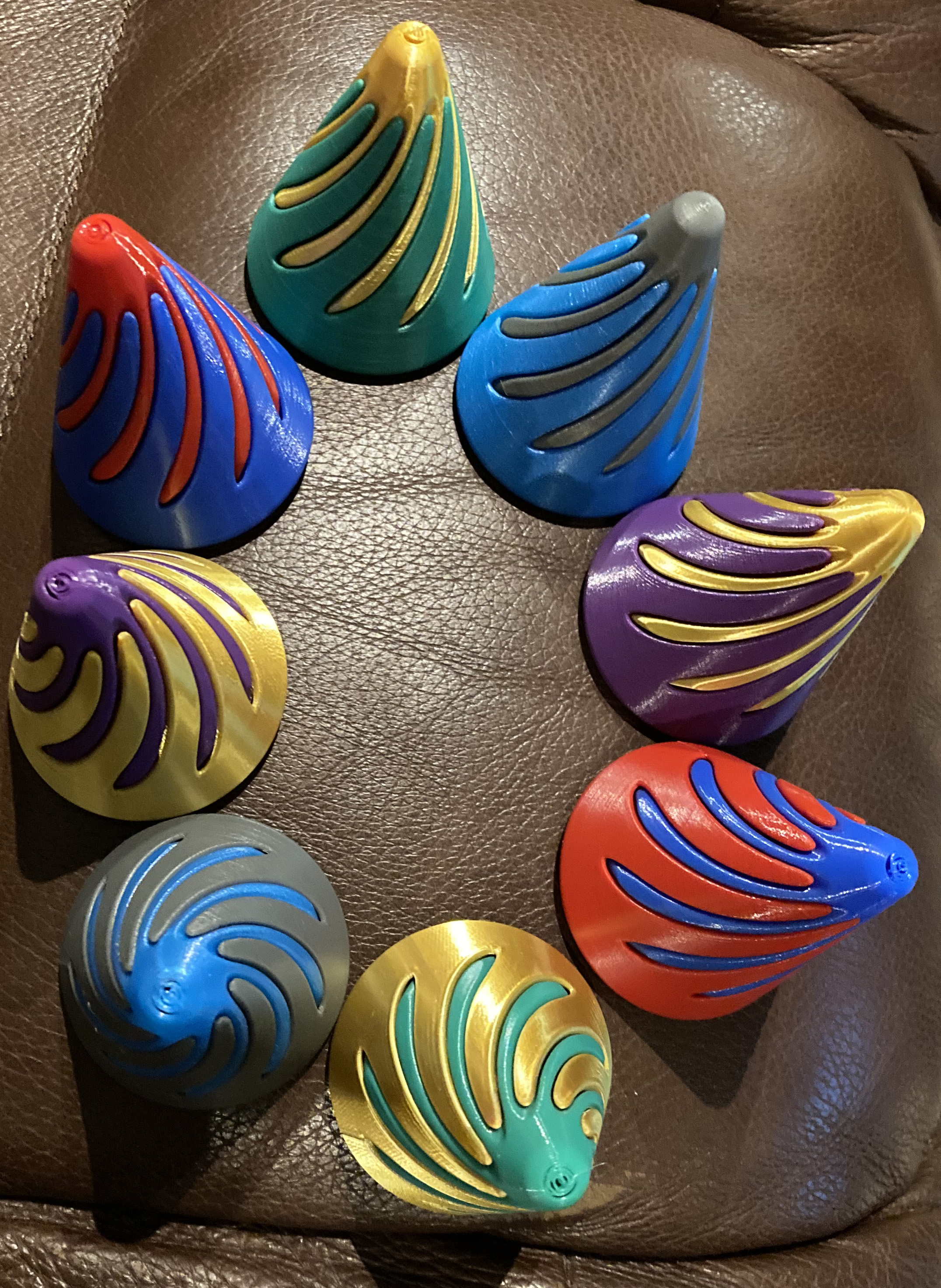 Quieter twisting fidget pass through cones