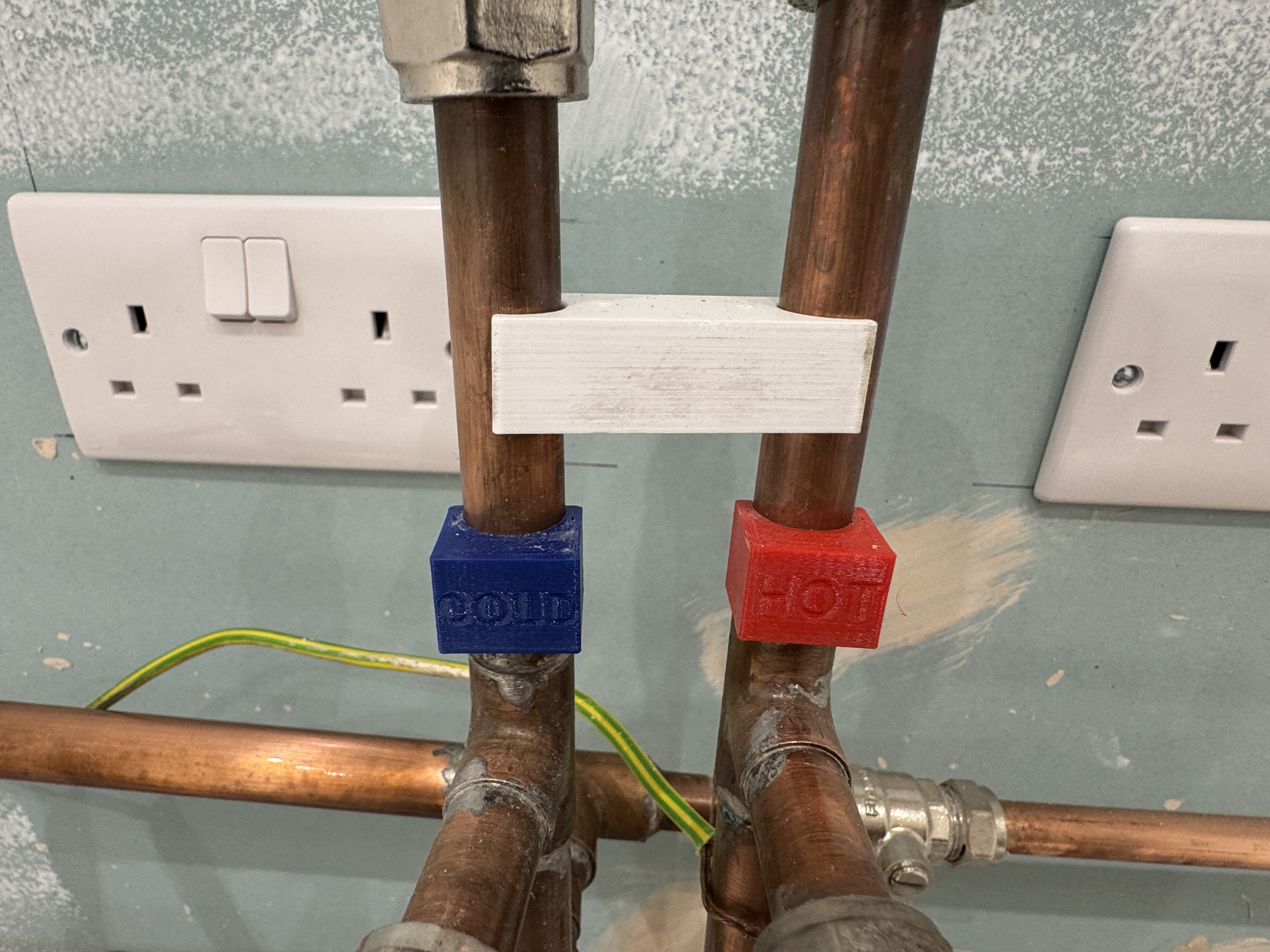 Hot and Cold pipe marking and pipe spacers