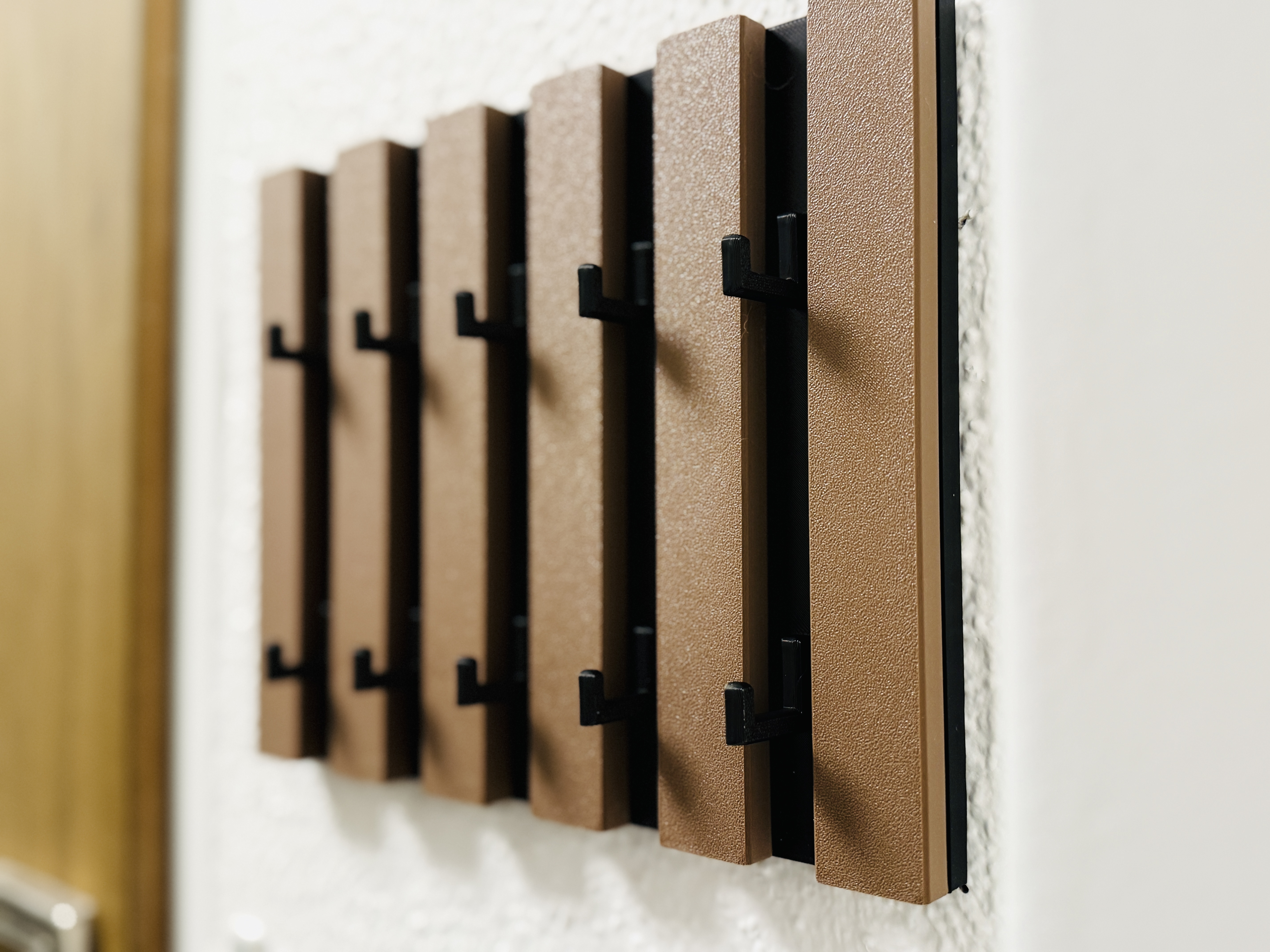 PANO key box in an acoustic wood panel design