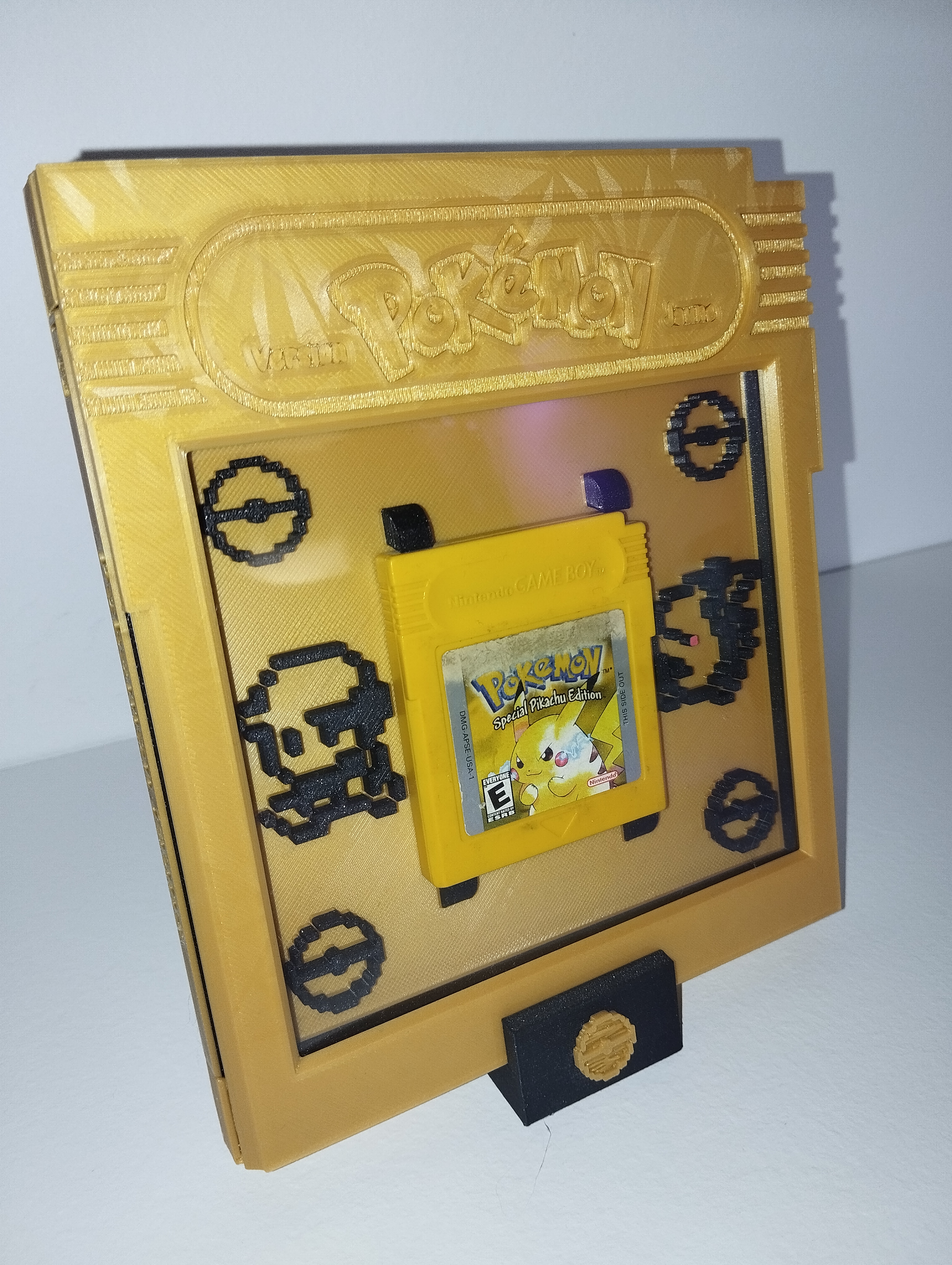 Display for loose yellow pokemon cartridges