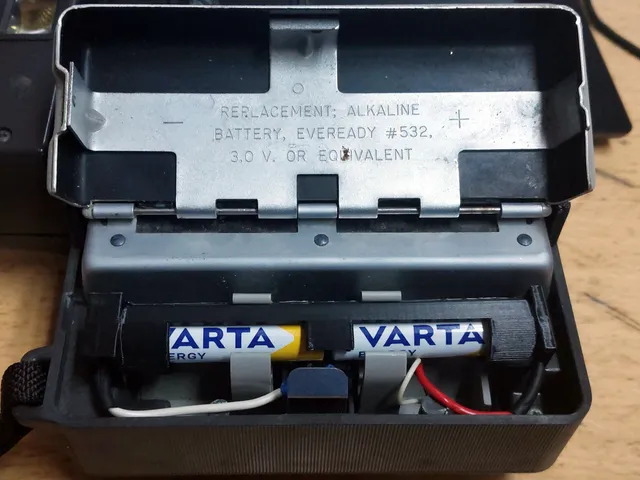 532 to AAA battery holder for Polaroid cameras