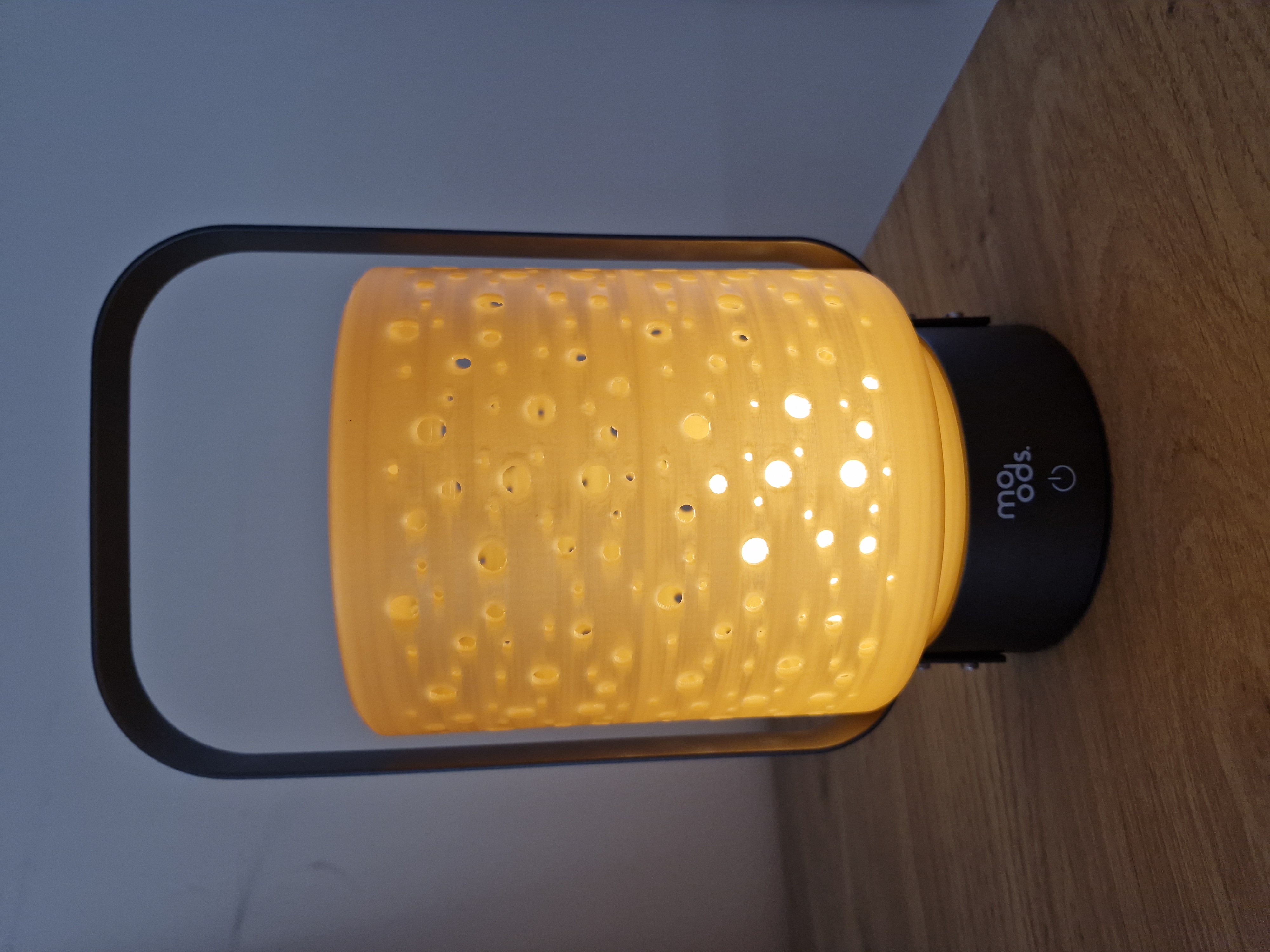 Table lamp with holes