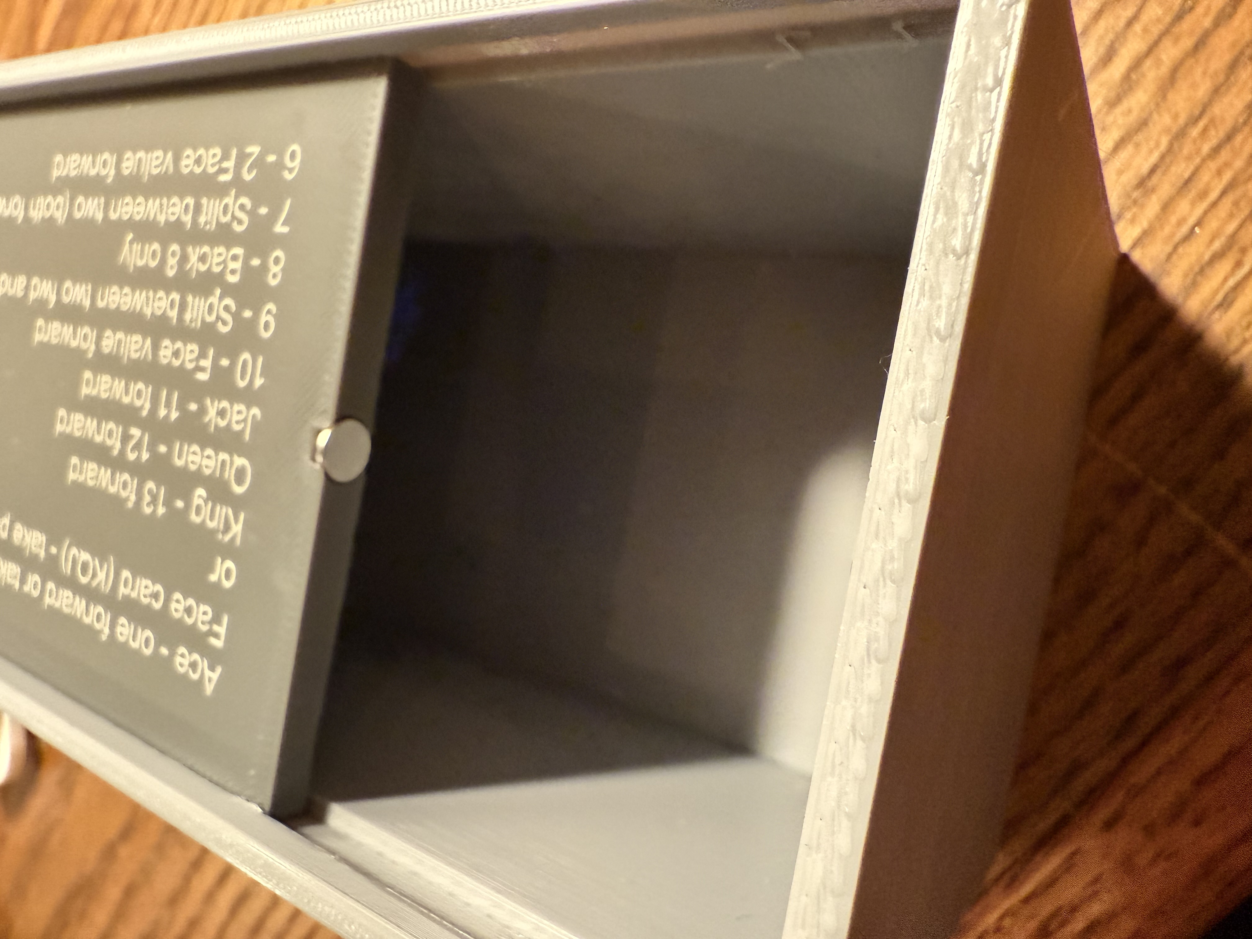 Portable slide lid box for Pegs and Jokers