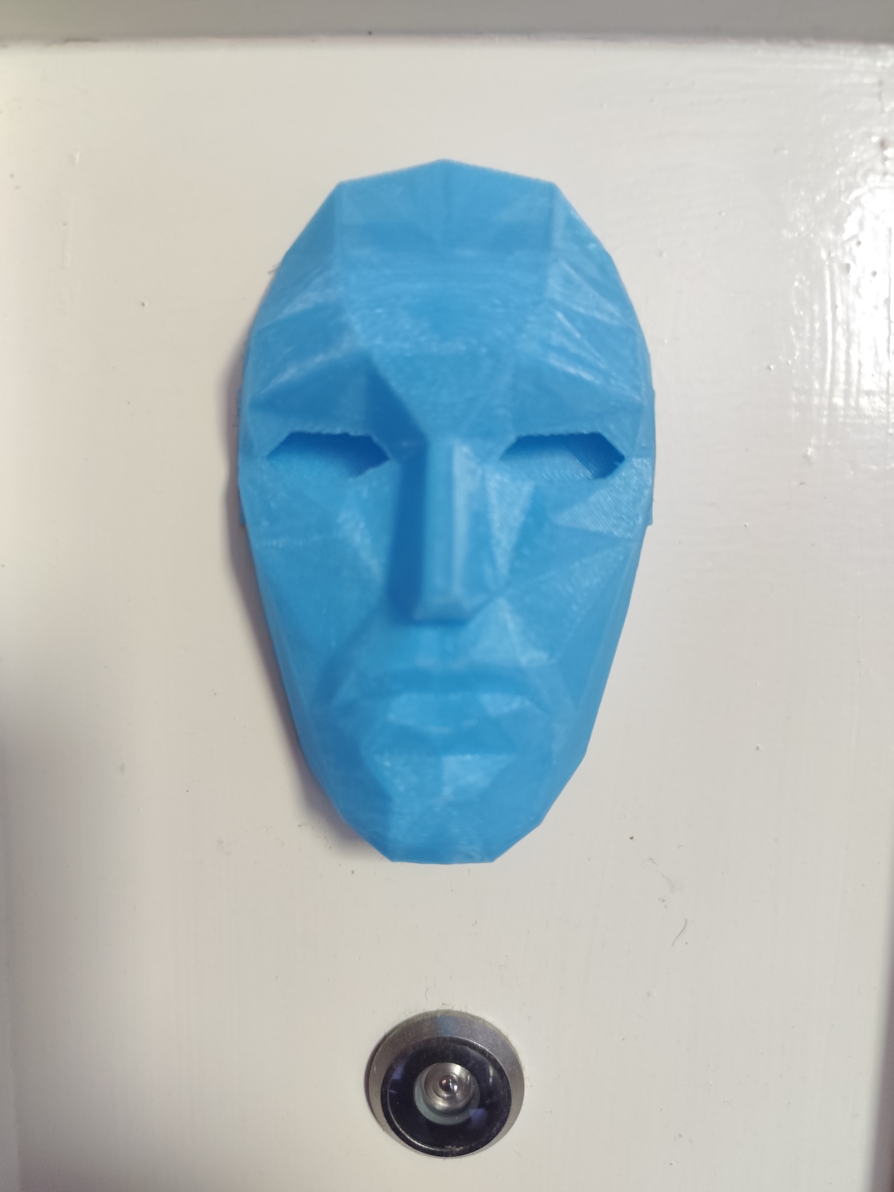 small mask to stick on door