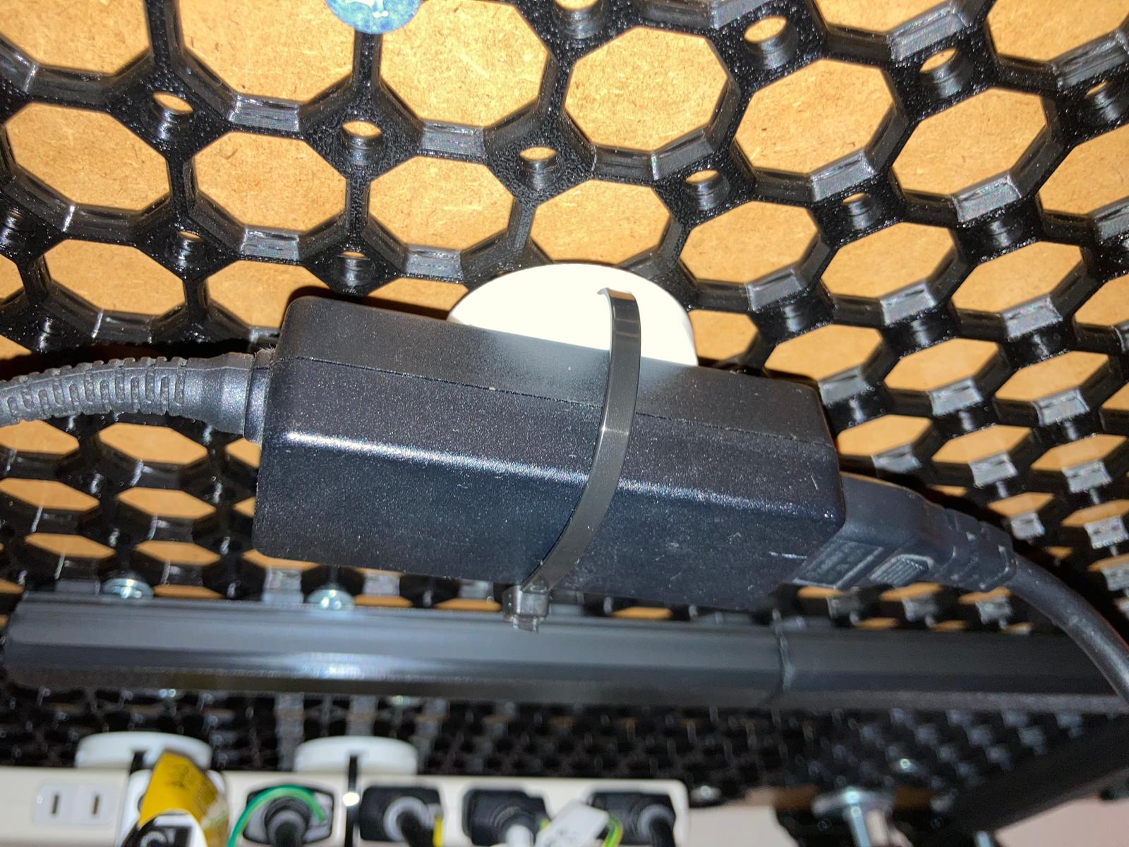 Multiboard underware zip-tie holder