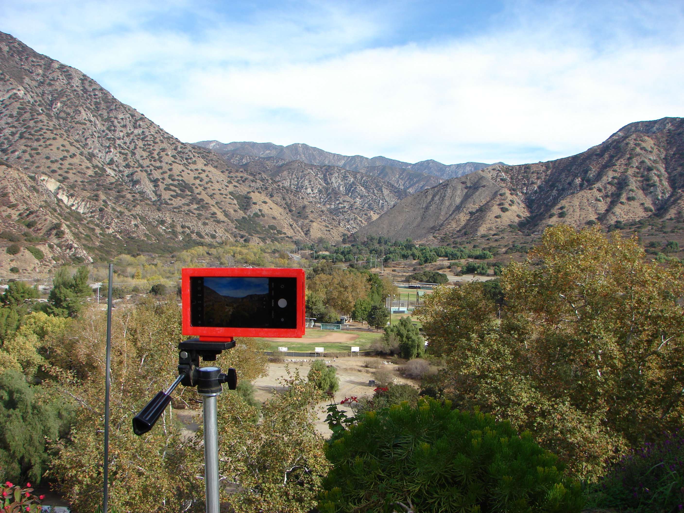 Cell phone to camera tripod mount
