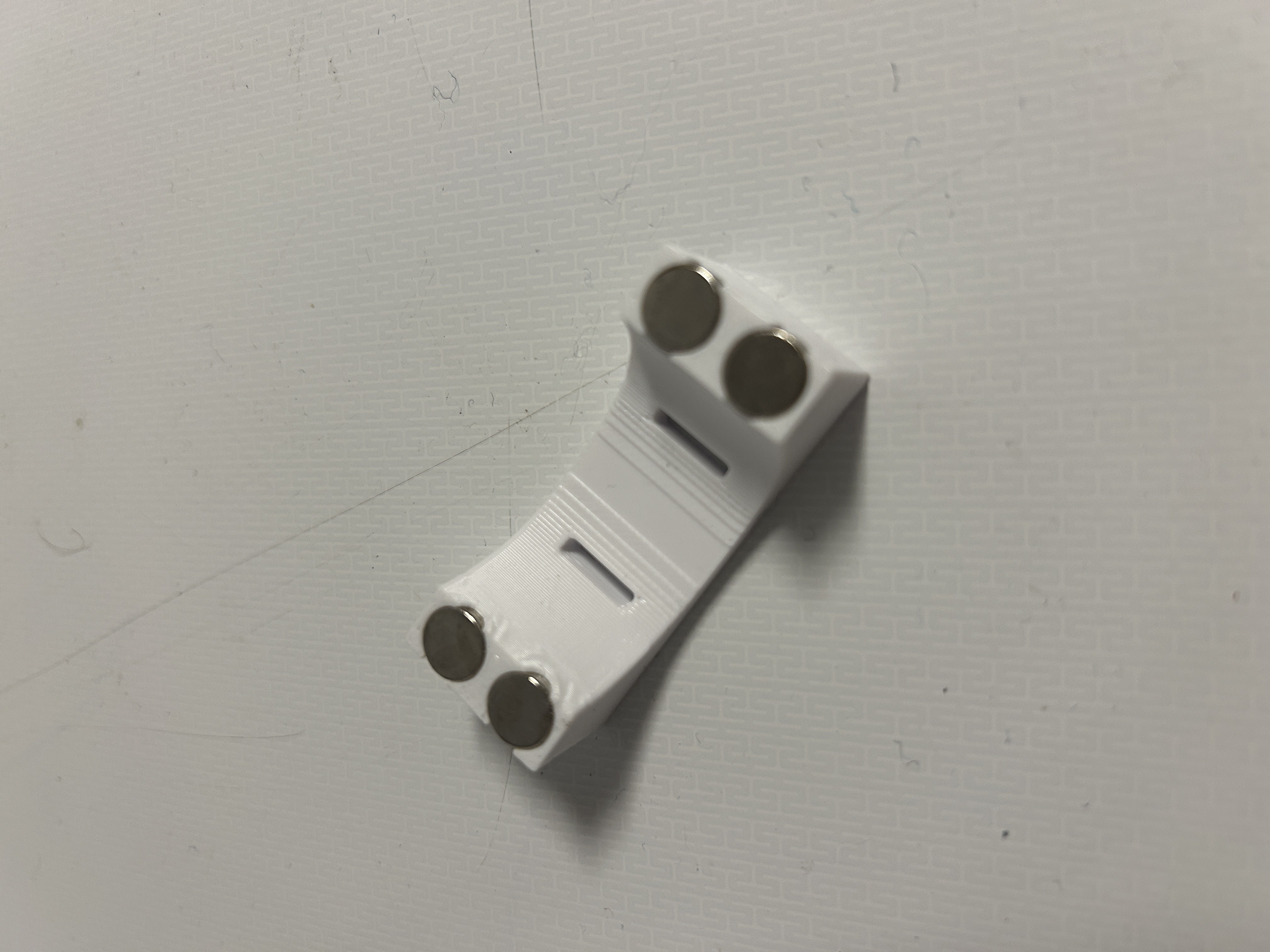 Cable holder with magnets and velcro cable ties