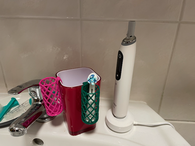 Holder for electric toothbrush head