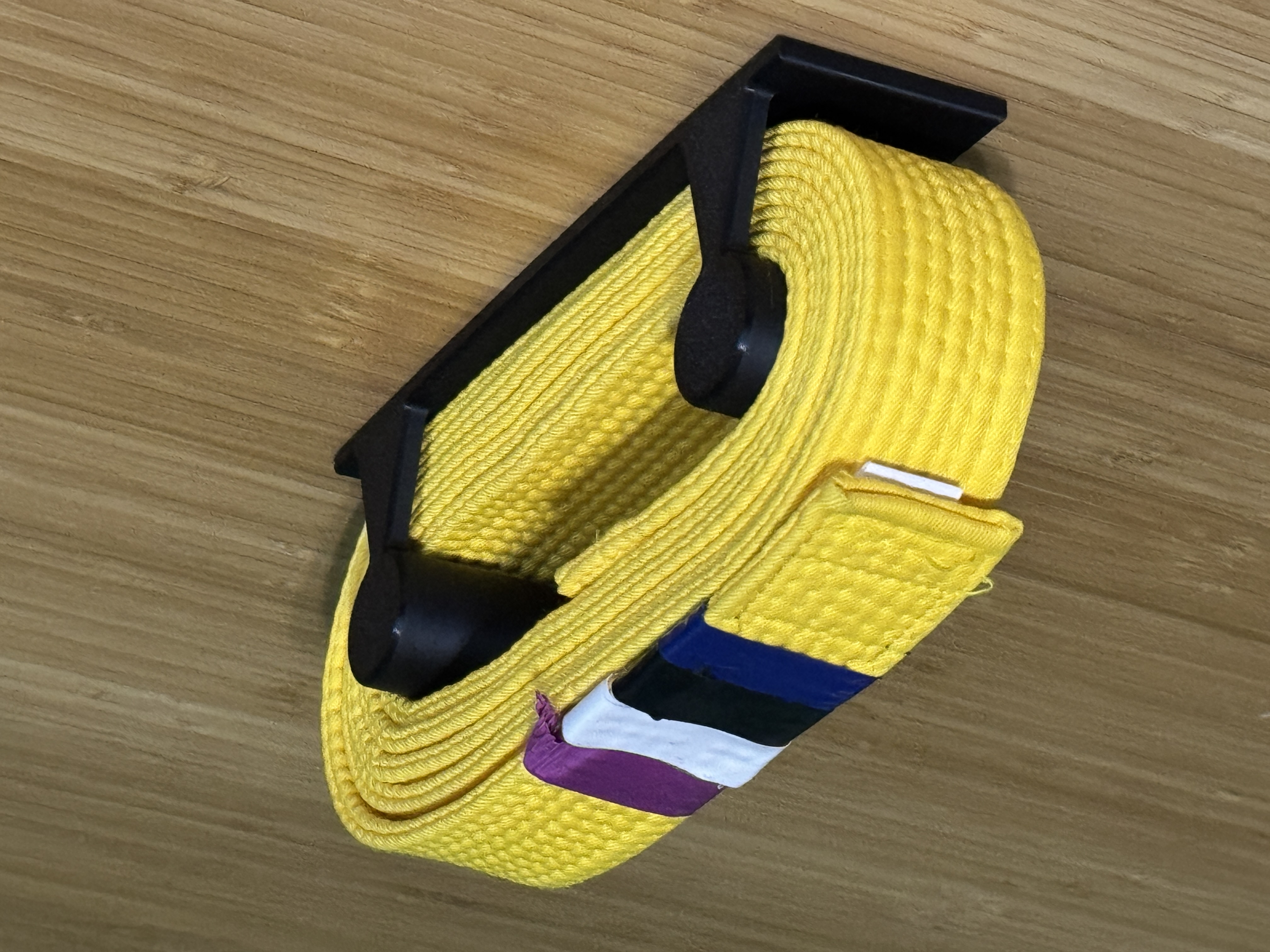 Karate belt hanger