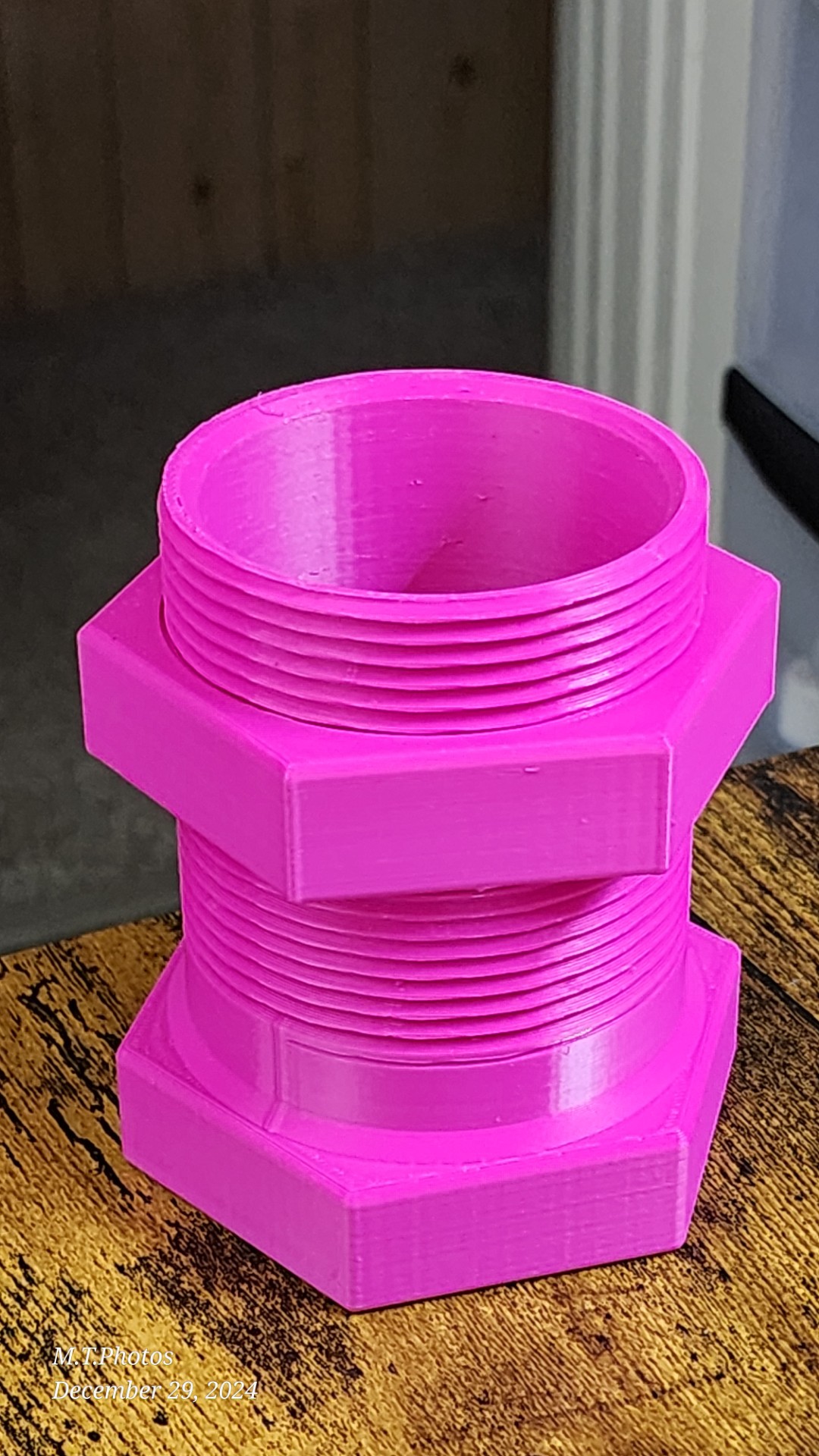 Nut and bolt pen holder