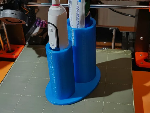 Oral B iO Toothbrush and paste holder.