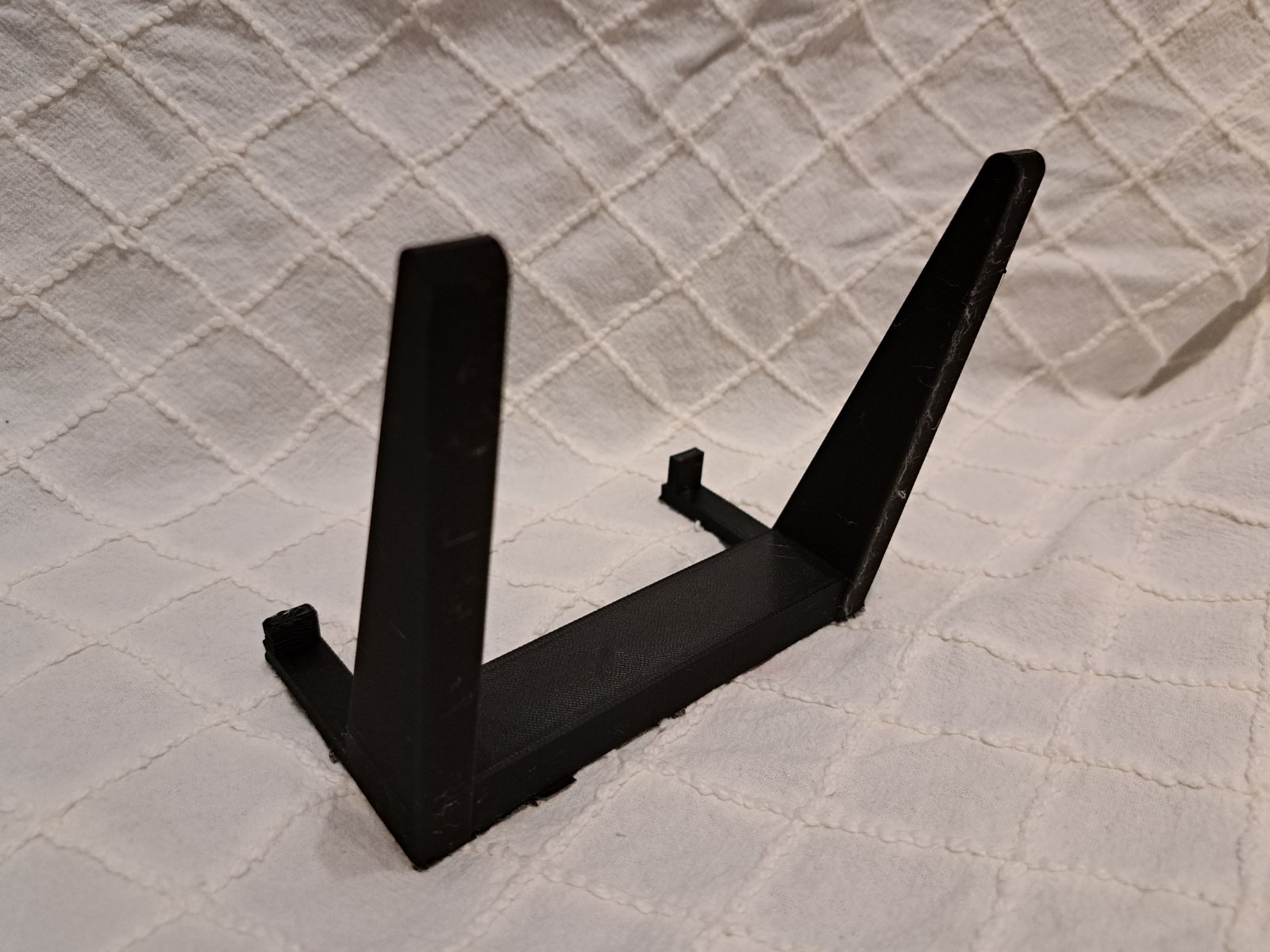 angled holder for clocks