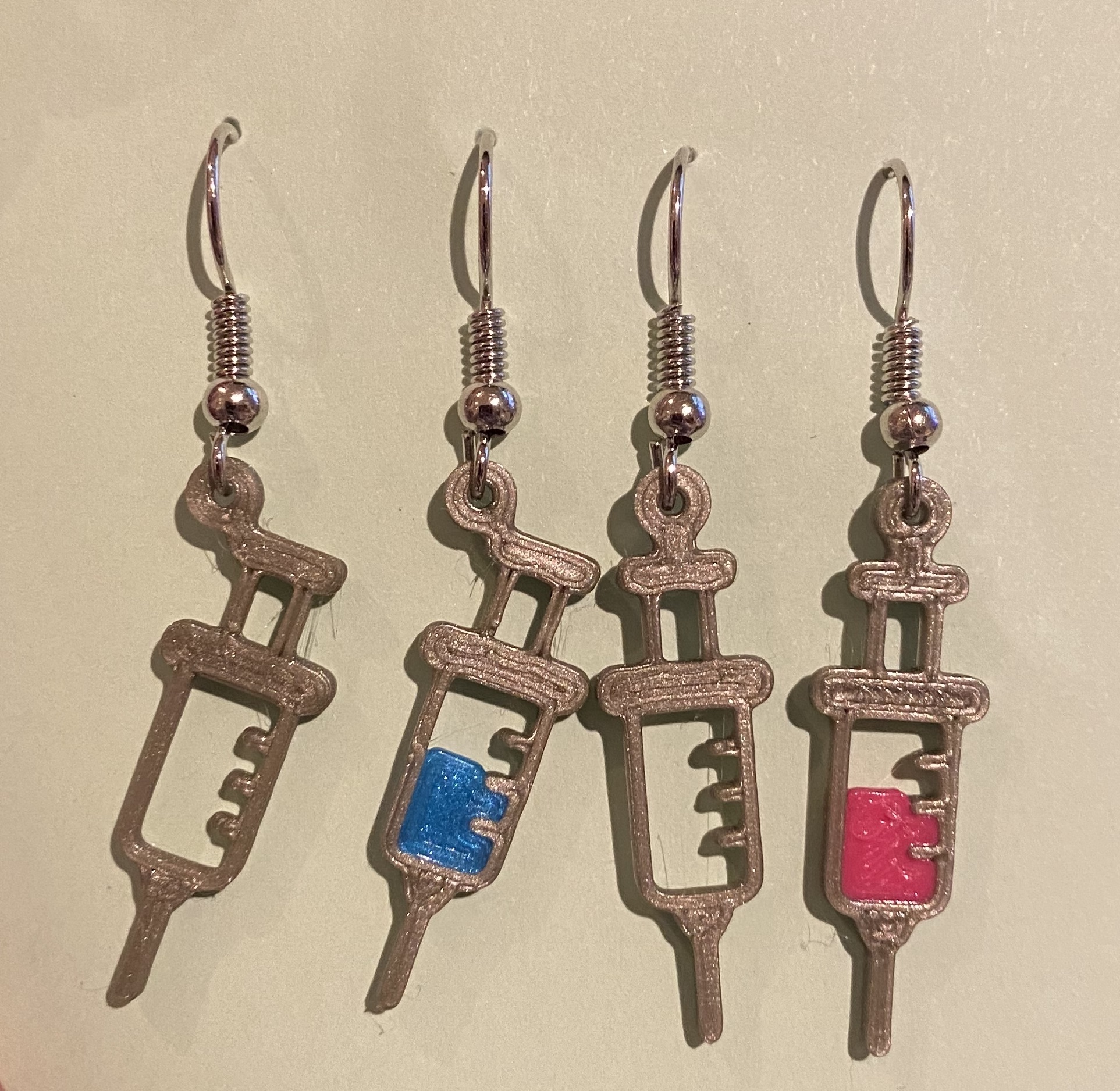 Syringe earrings