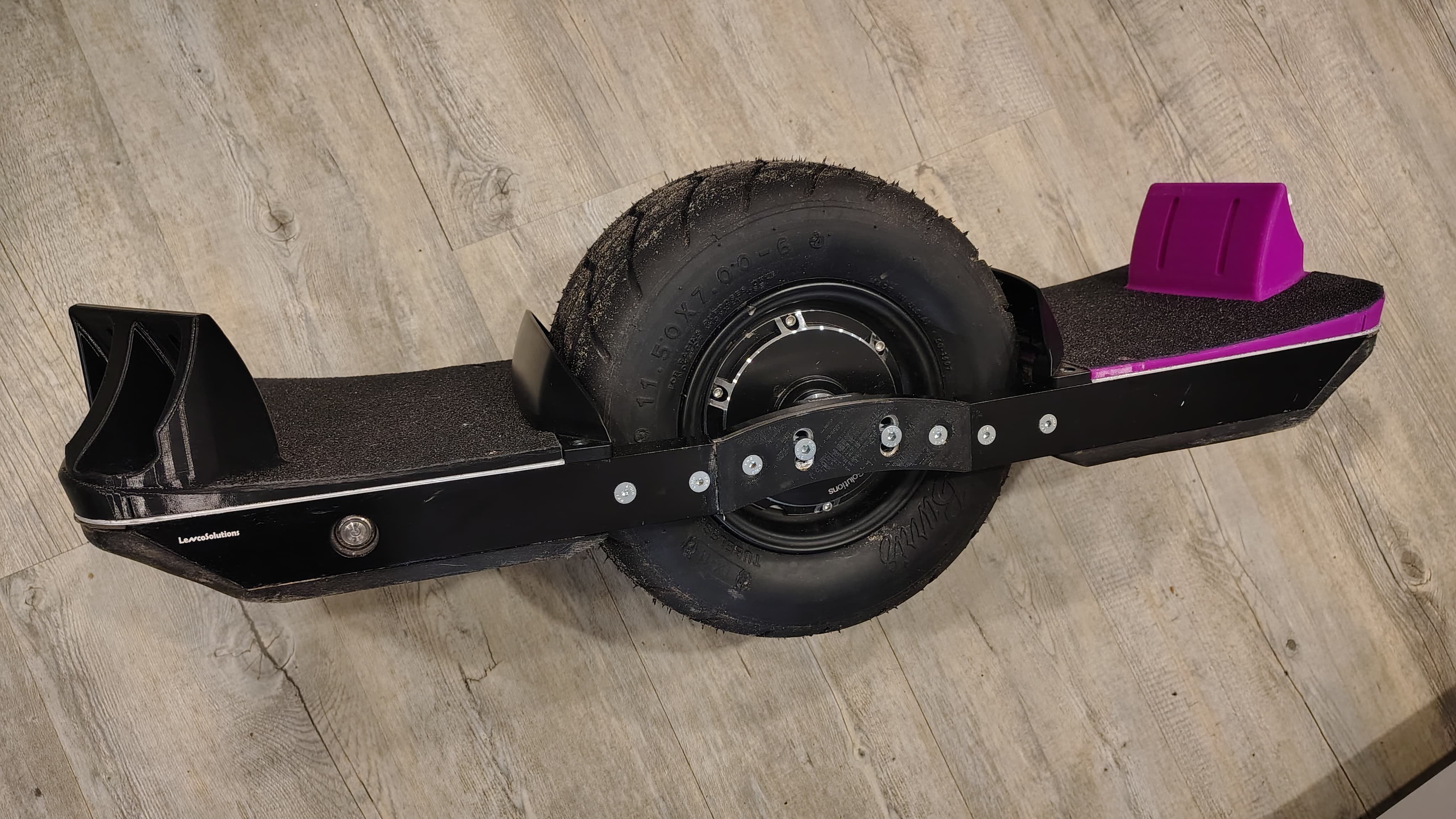 Onewheel XR footpads with Flight Fins mounts outside