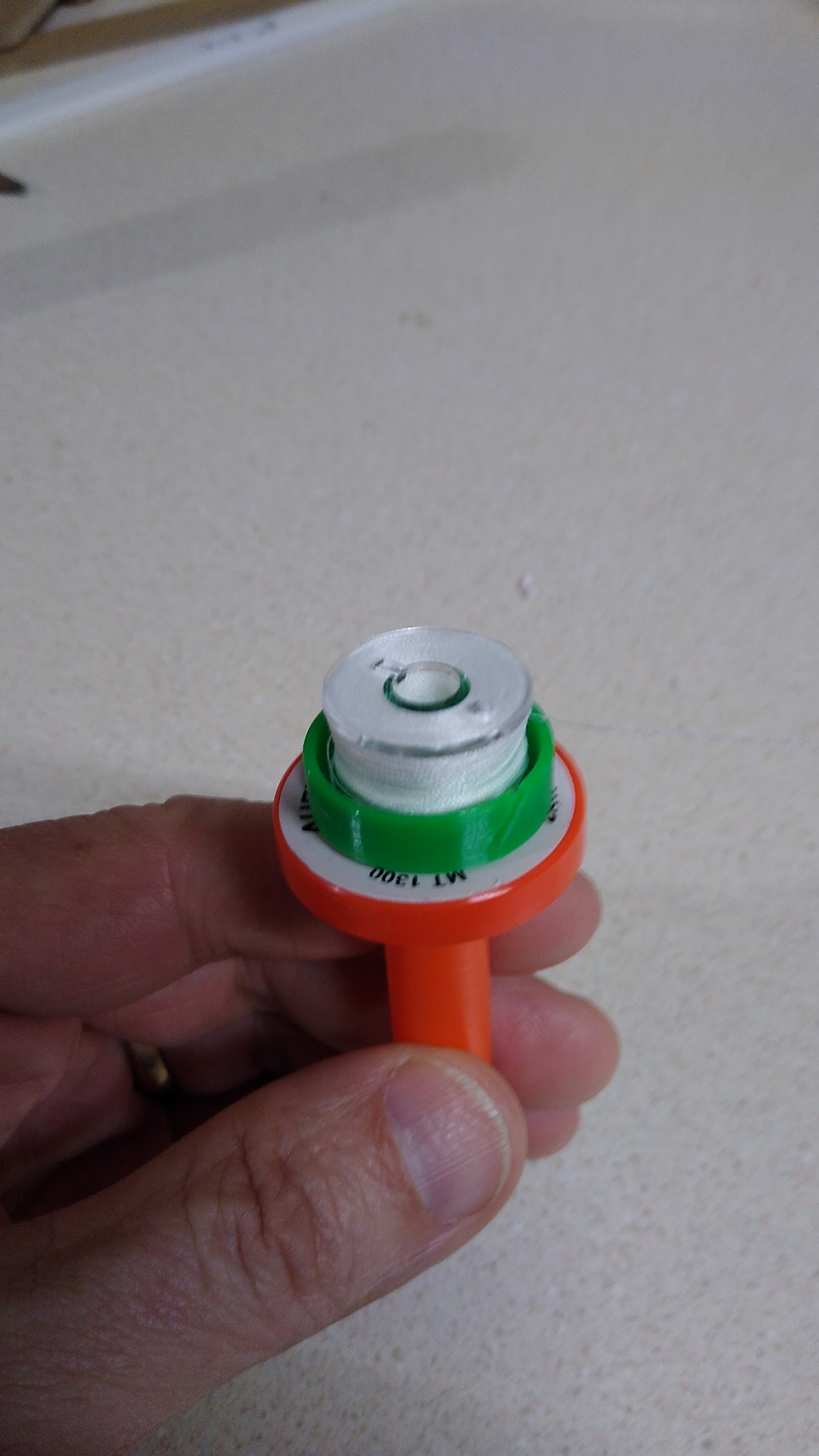 Sewing bobbin spool holder