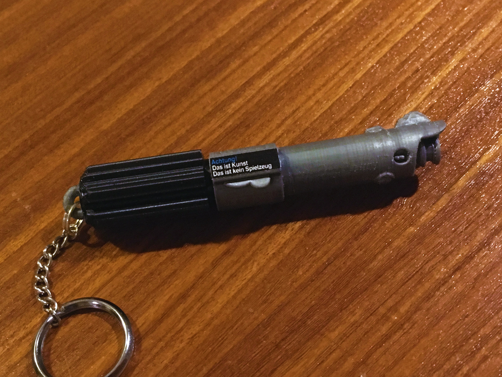 Fortune Bearing Lightsaber Key Fob (Star Wars) by Baschz Leeft