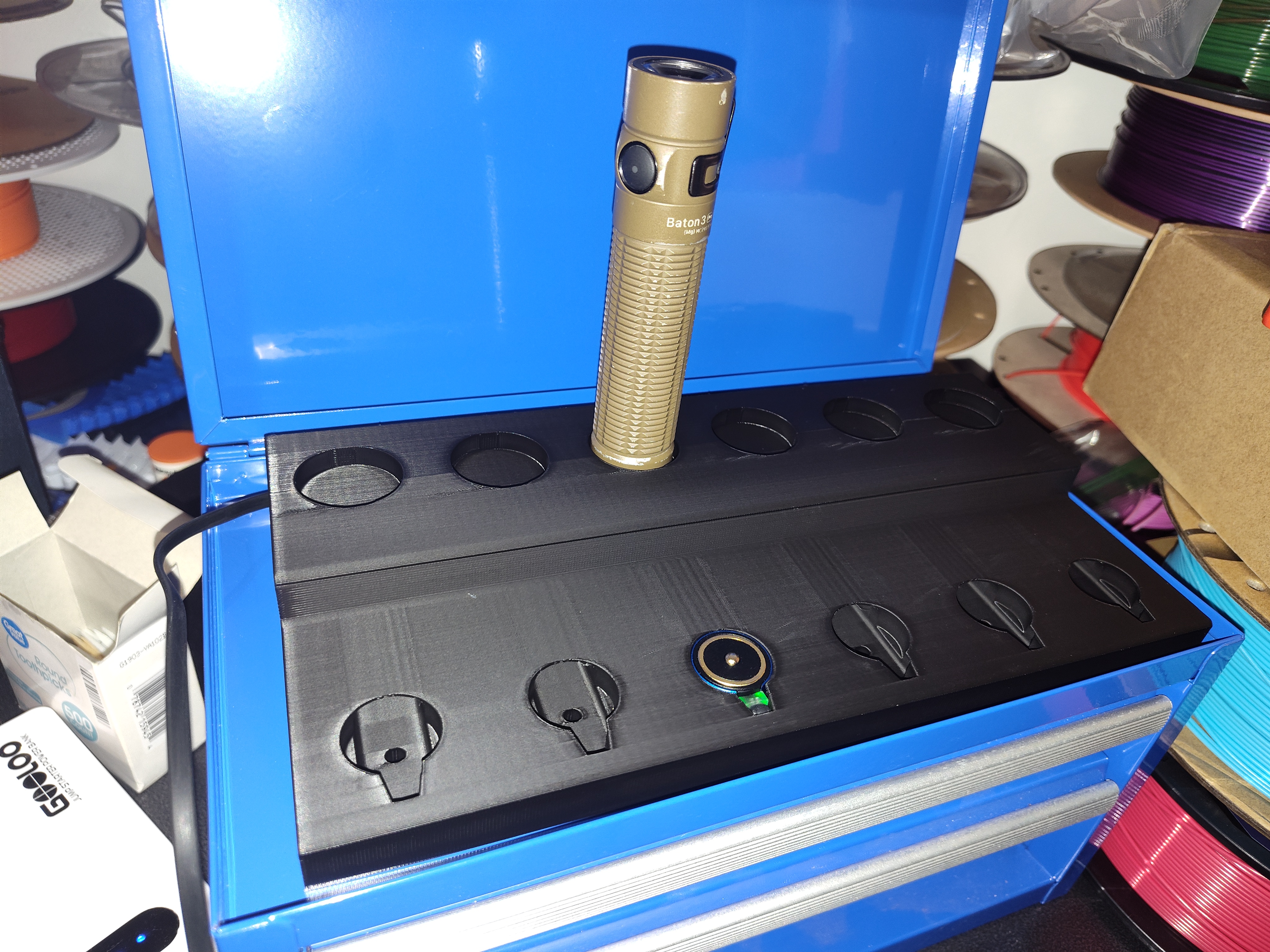 Olight 6 Bay charge stand.