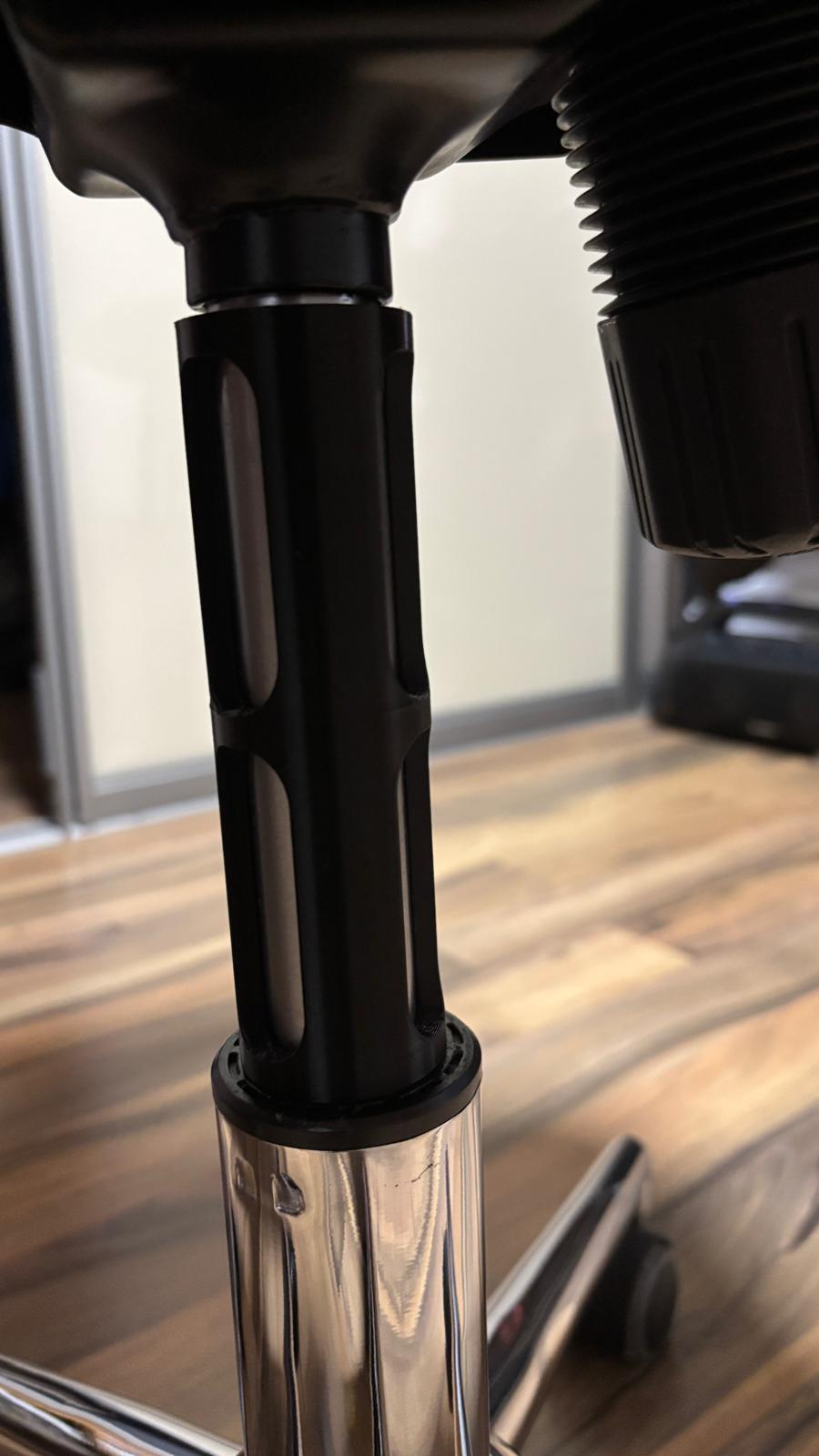 Spacer for office chair gas cylinder